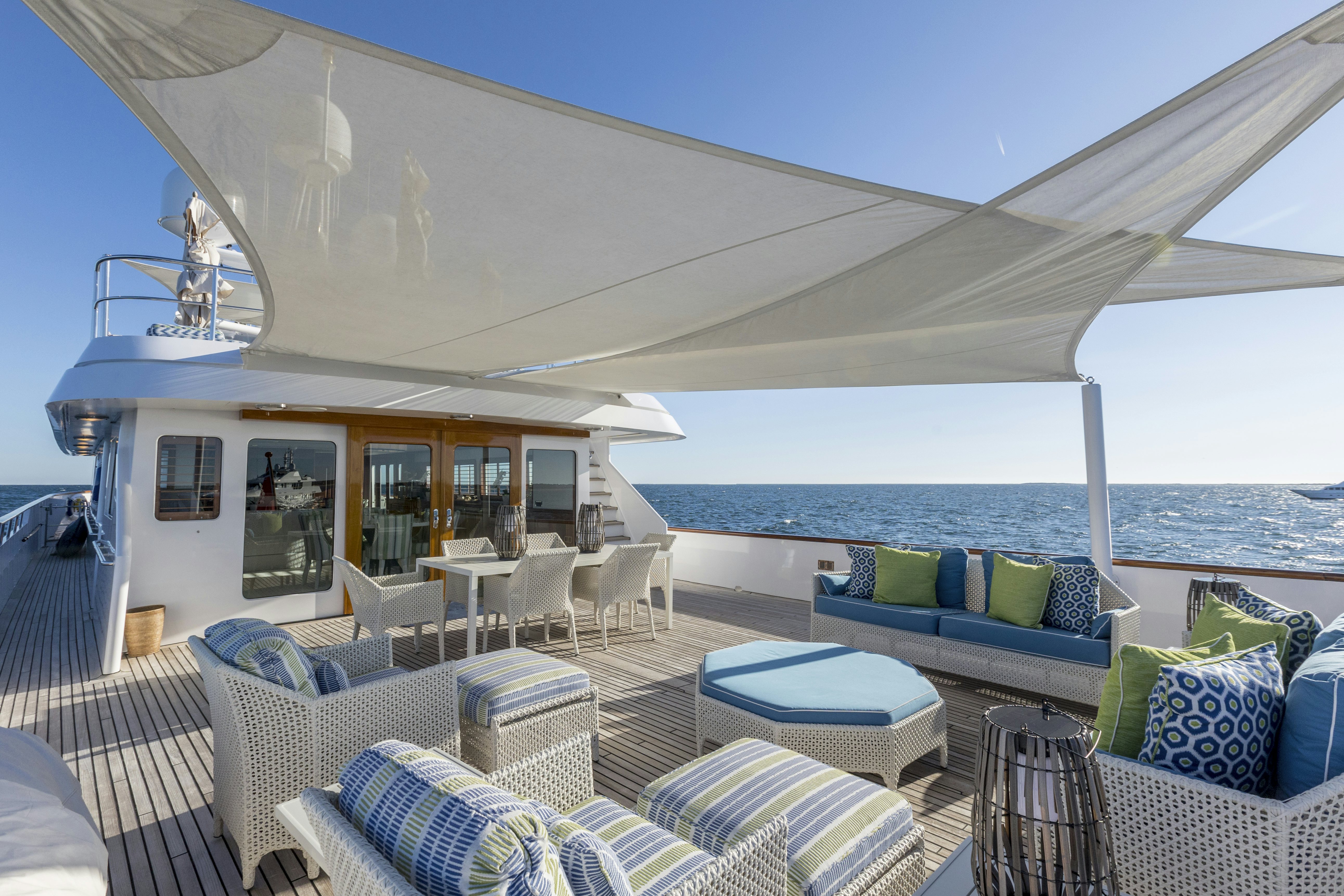 a large white tent with a view of the ocean aboard TRUE NORTH Yacht for Sale