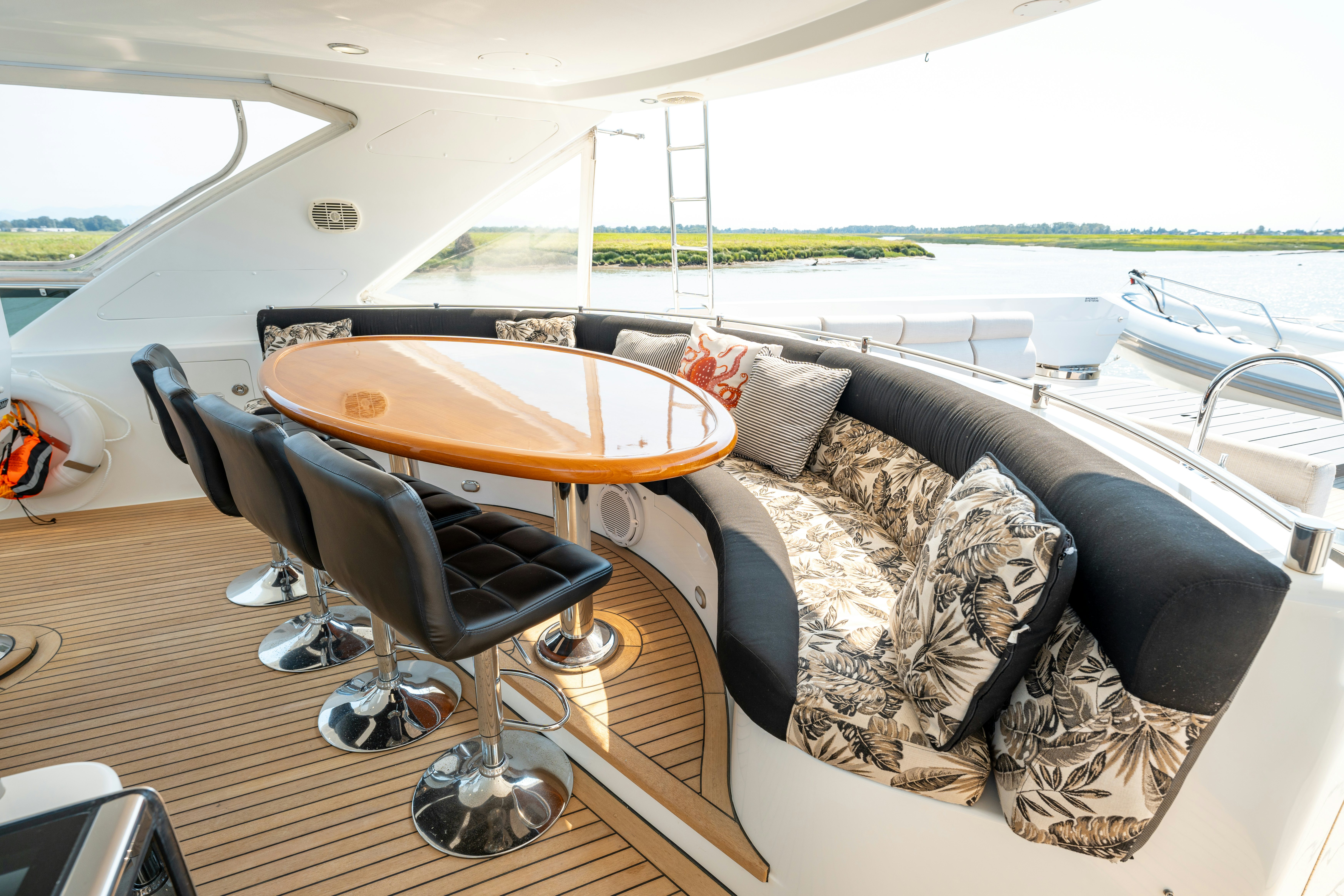 a table and chairs on a boat aboard MEMORY BANK Yacht for Sale