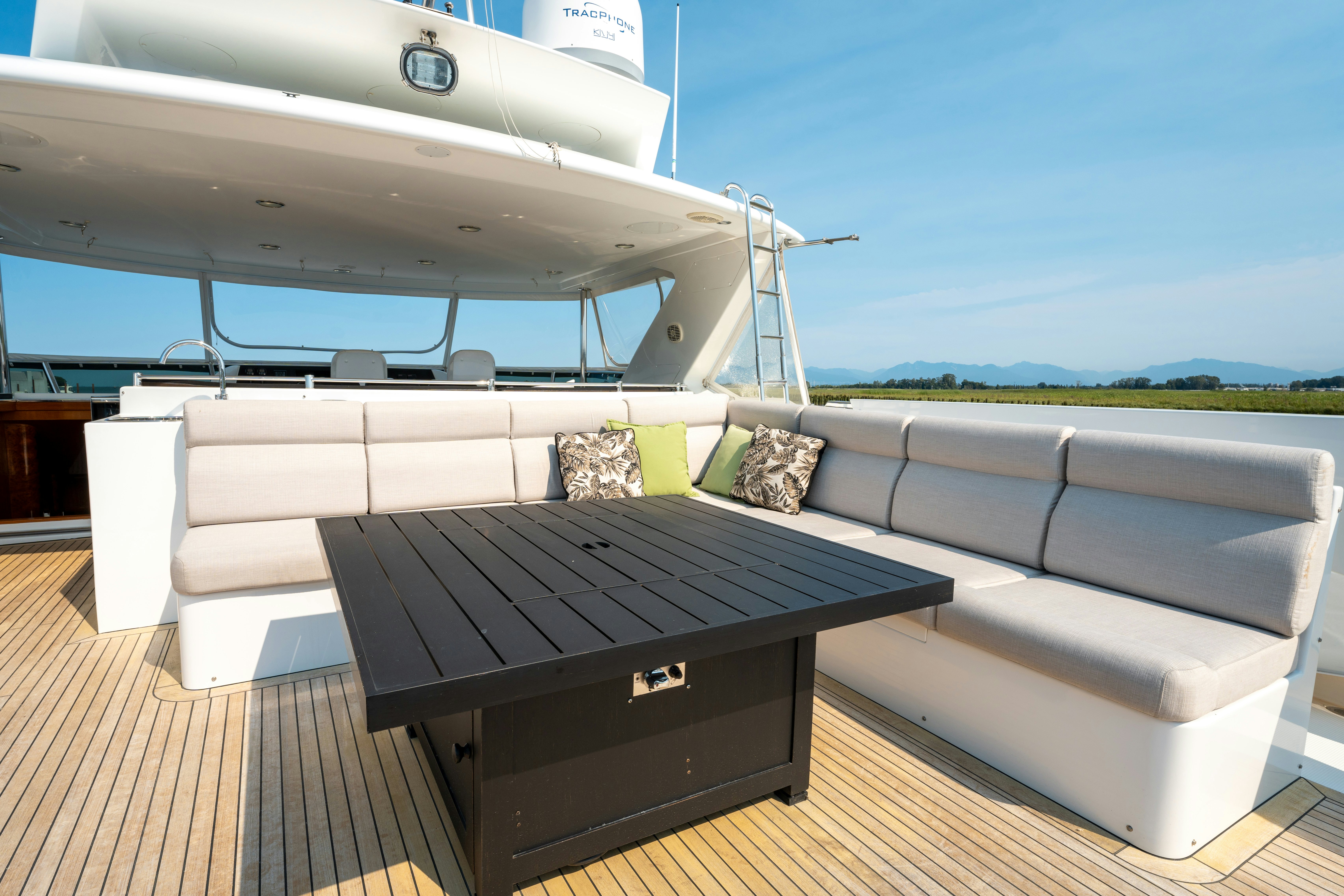 a couch on a deck aboard MEMORY BANK Yacht for Sale