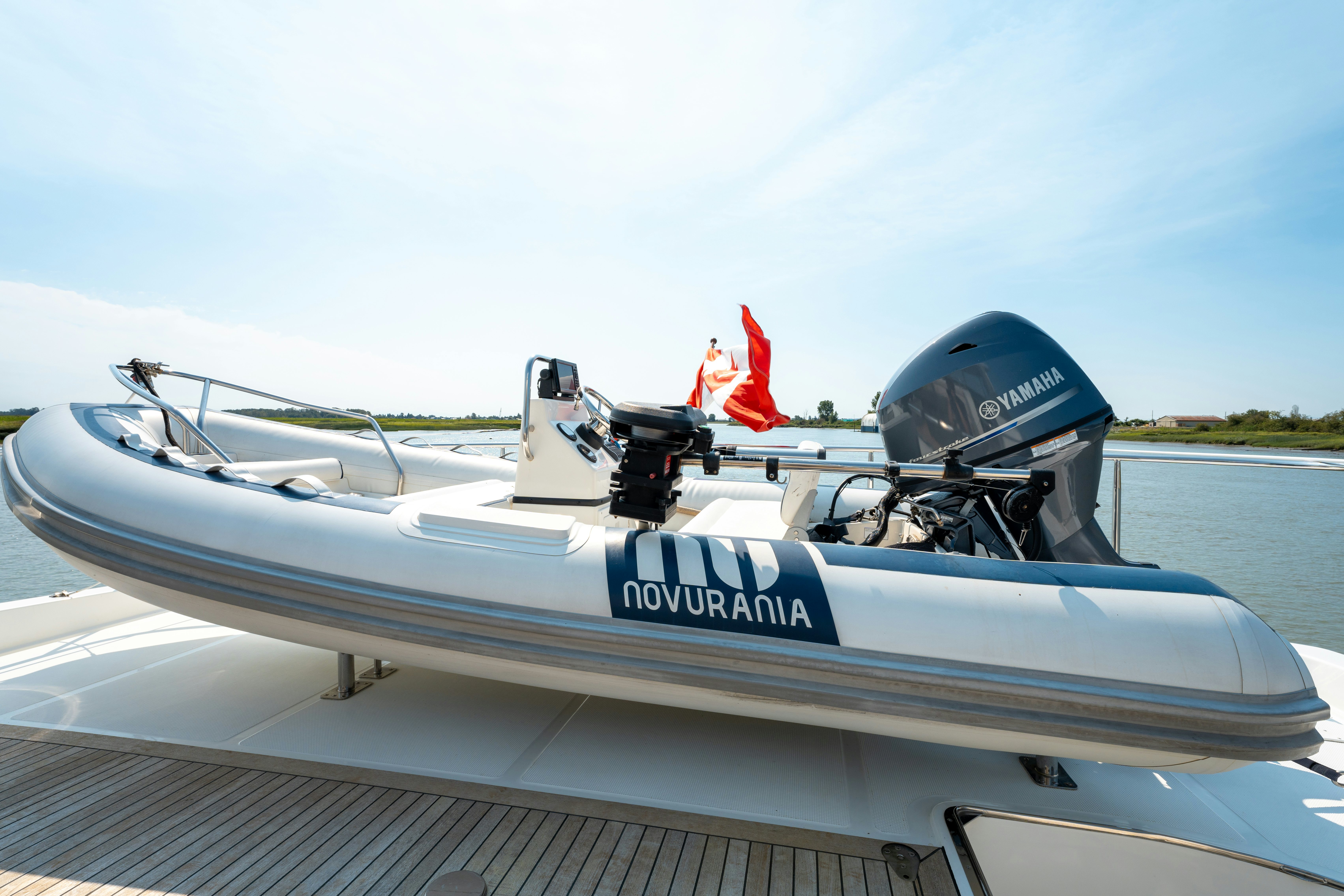 a boat with a satellite dish on the front aboard MEMORY BANK Yacht for Sale