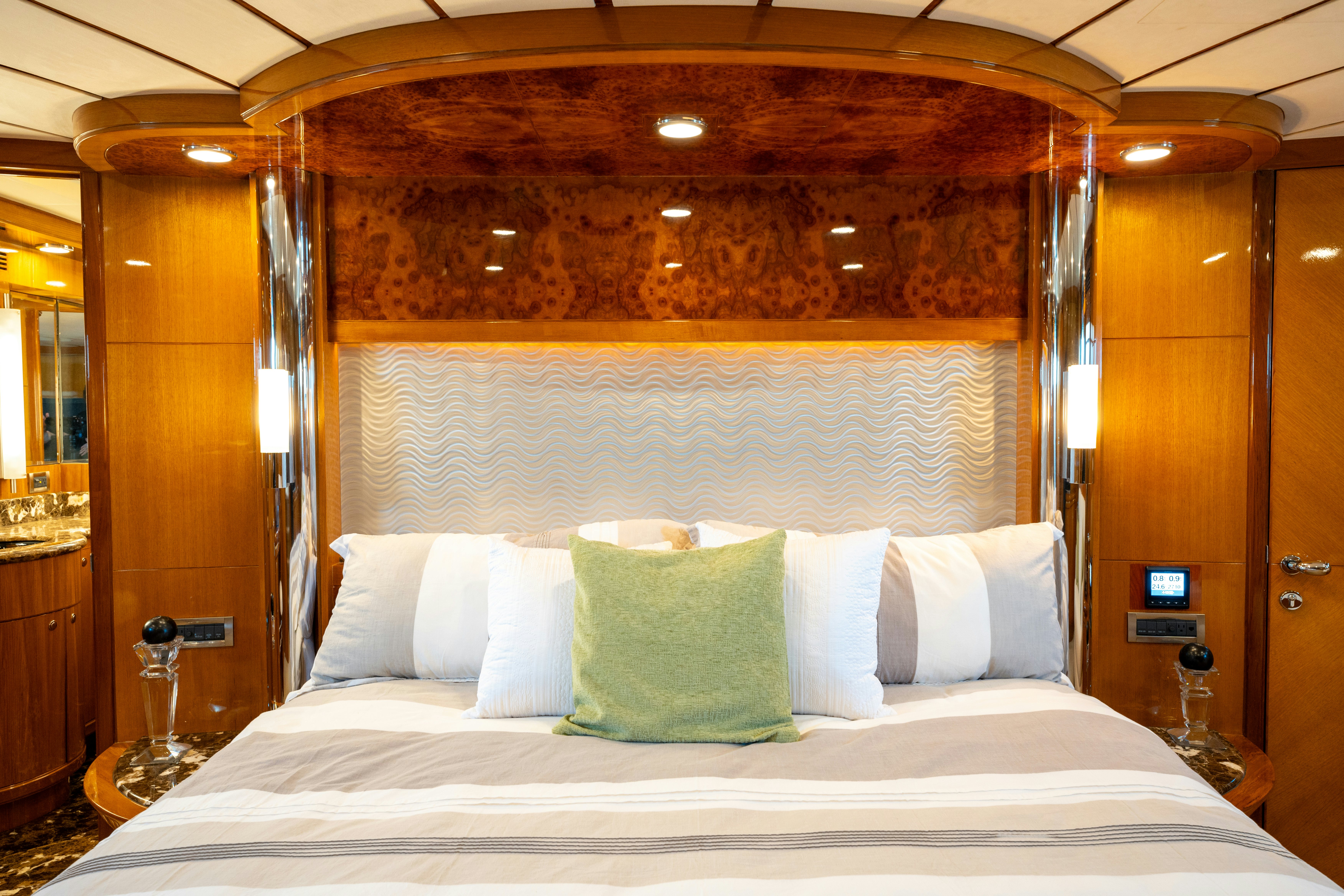a bed with white sheets aboard MEMORY BANK Yacht for Sale