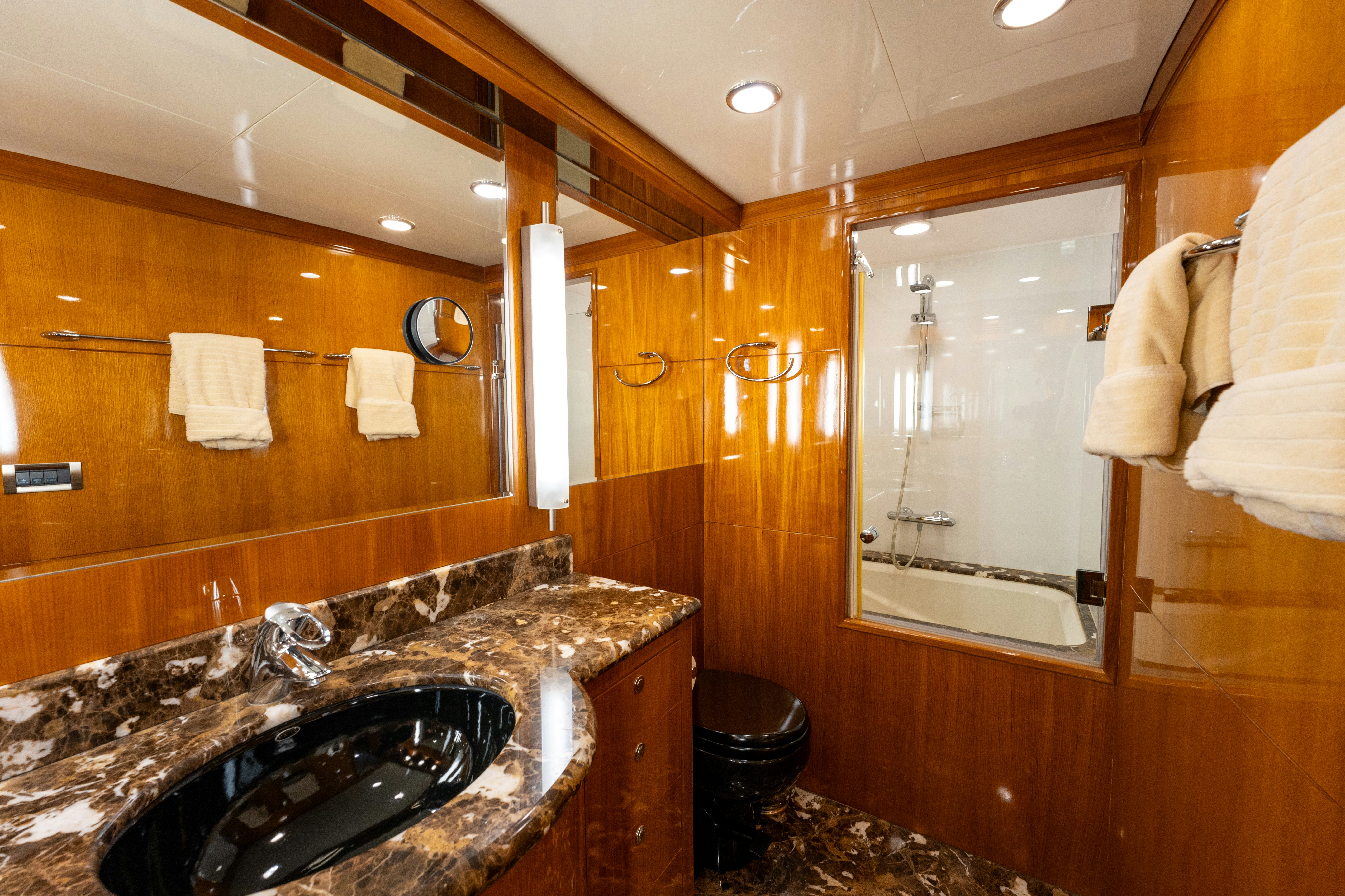 a bathroom with a marble countertop aboard MEMORY BANK Yacht for Sale