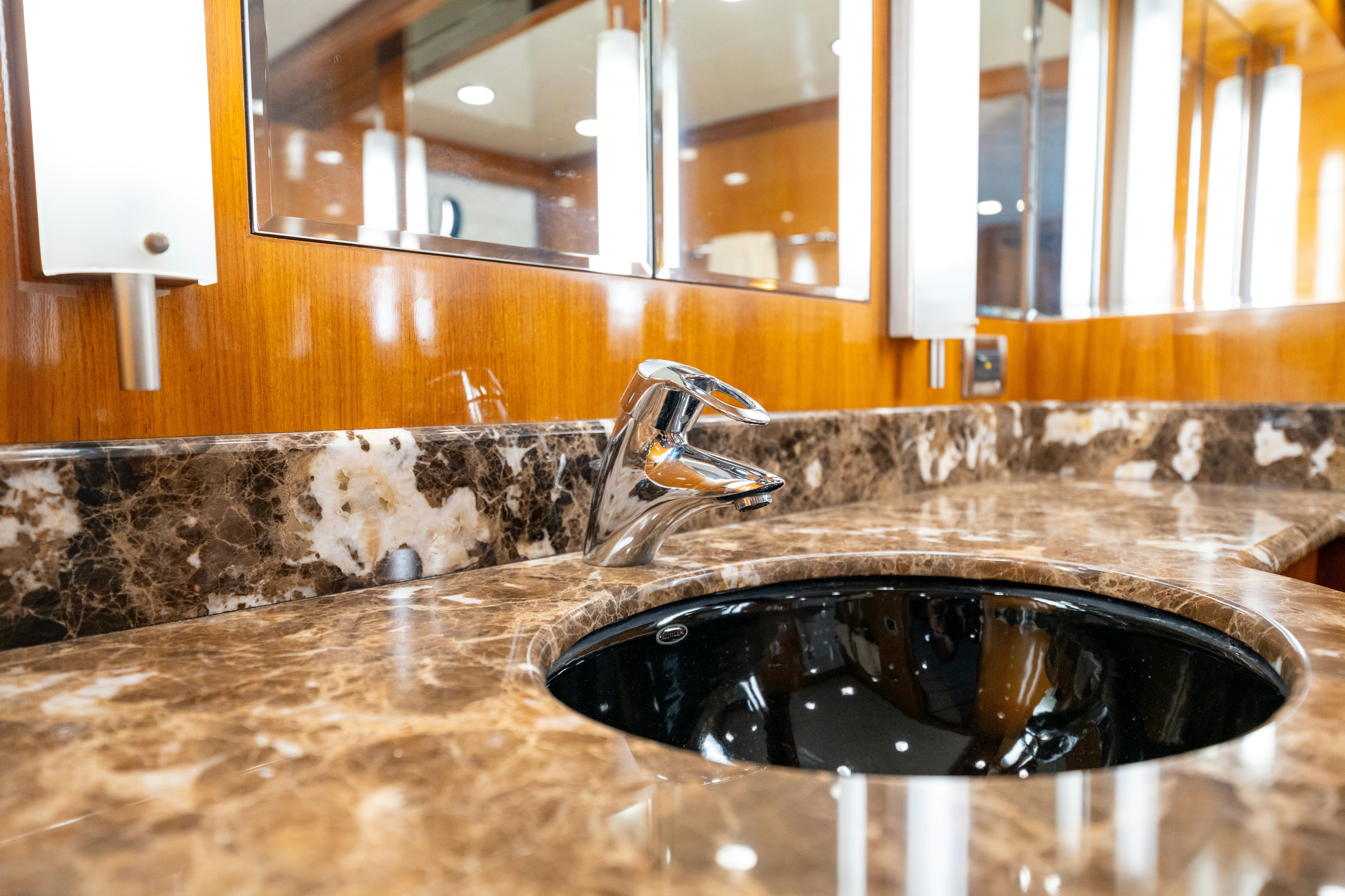 a sink and a granite countertop aboard MEMORY BANK Yacht for Sale