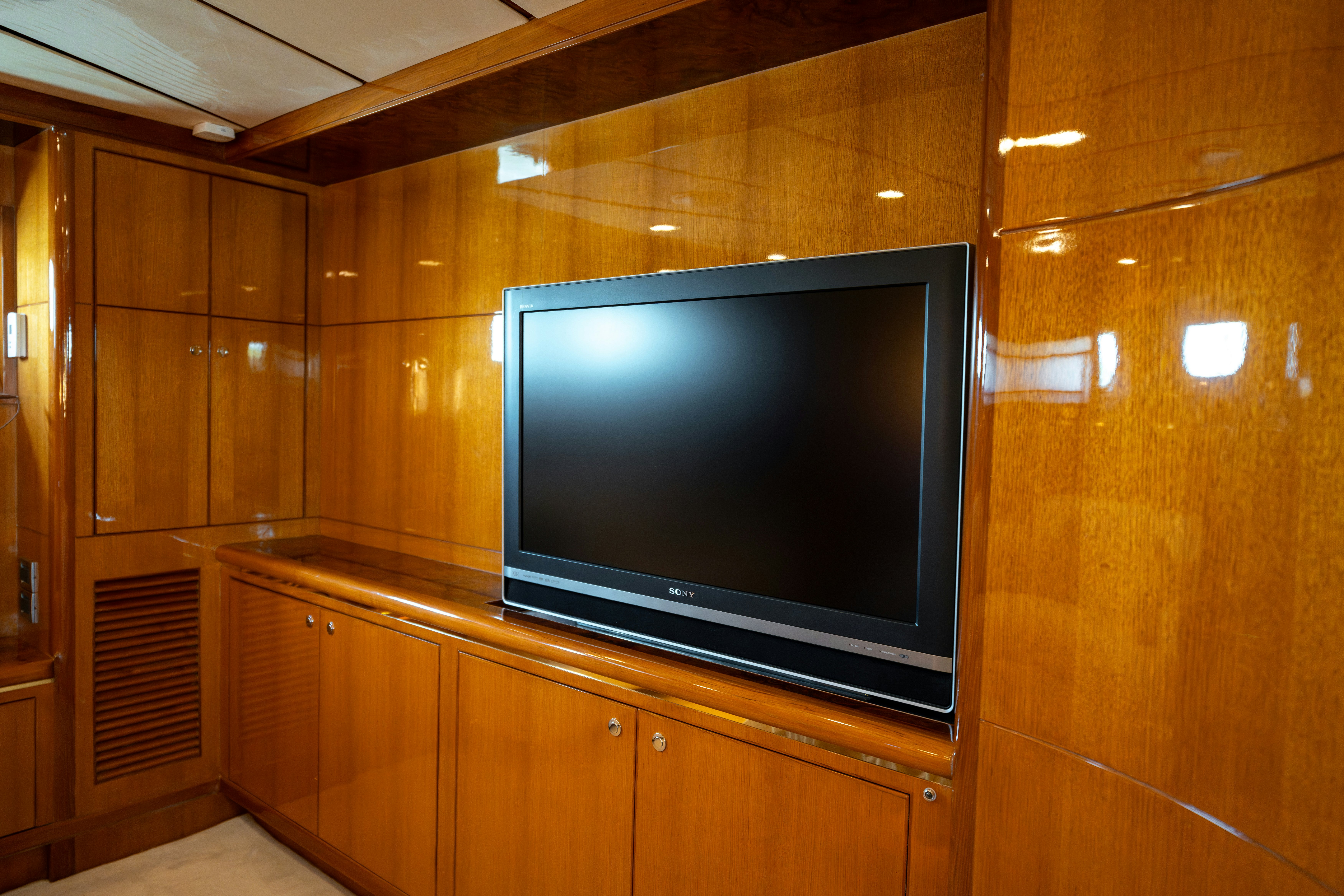 a tv on a cabinet aboard MEMORY BANK Yacht for Sale
