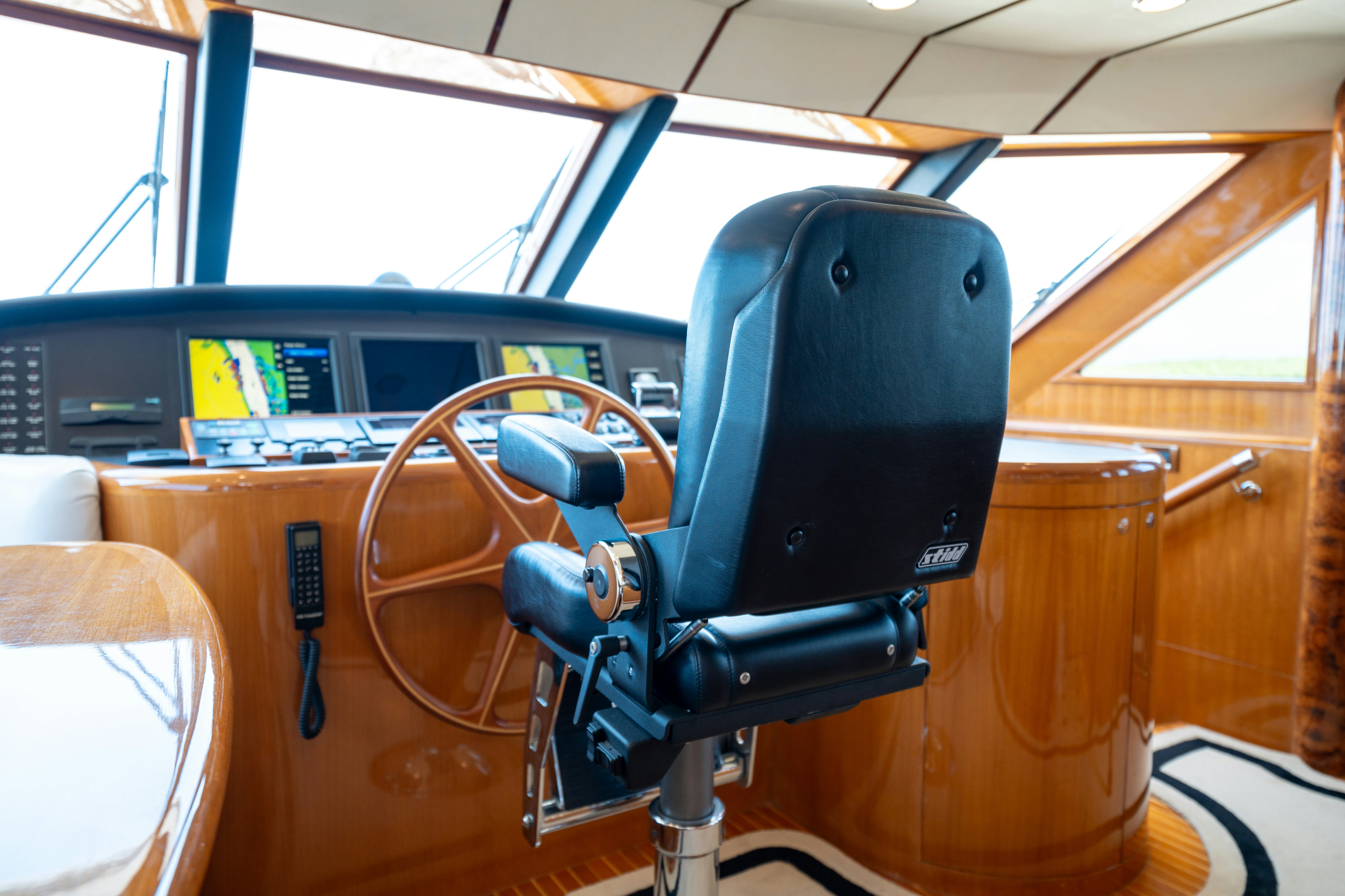 a black and orange motorcycle aboard MEMORY BANK Yacht for Sale