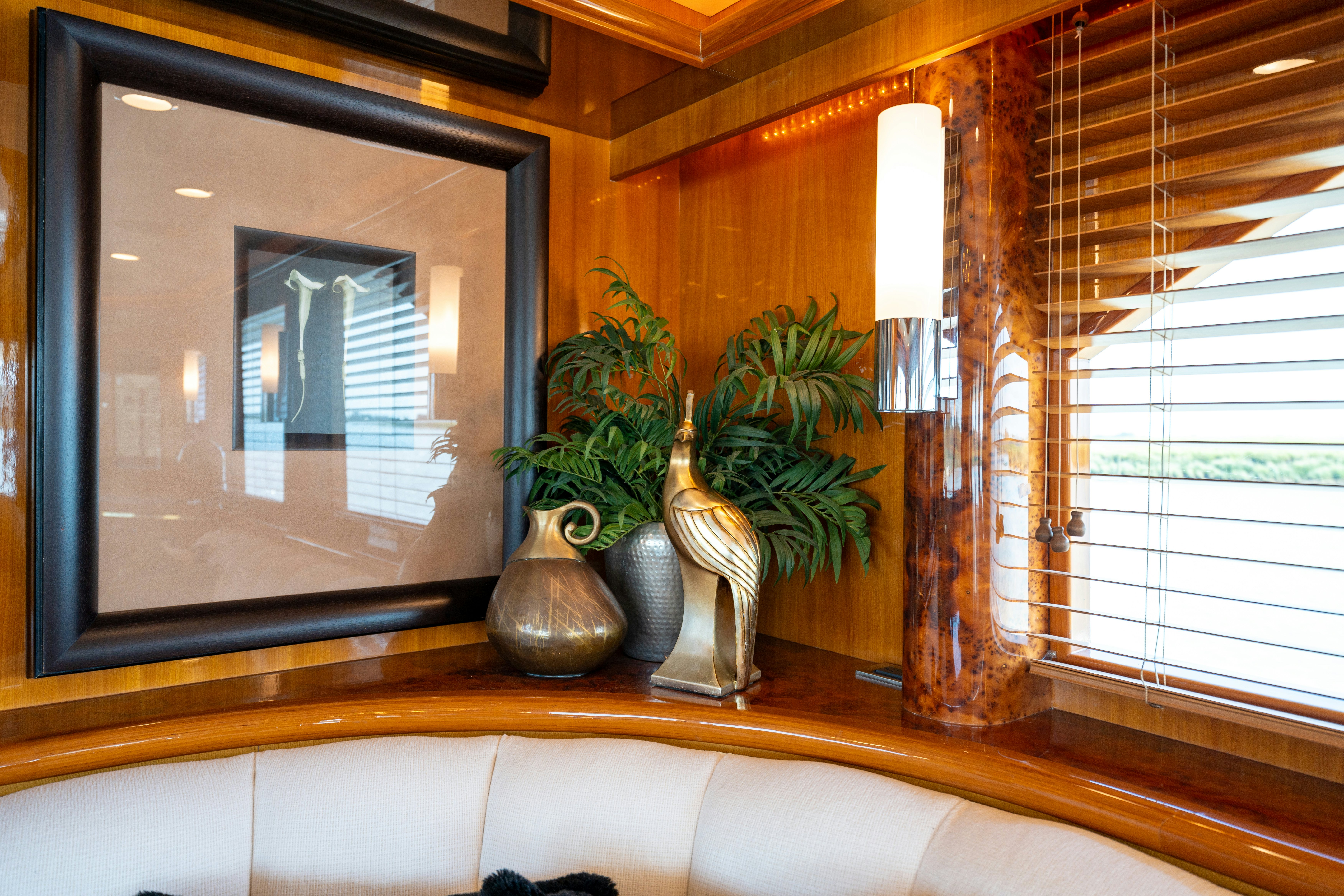 a vase and a plant in a room aboard MEMORY BANK Yacht for Sale