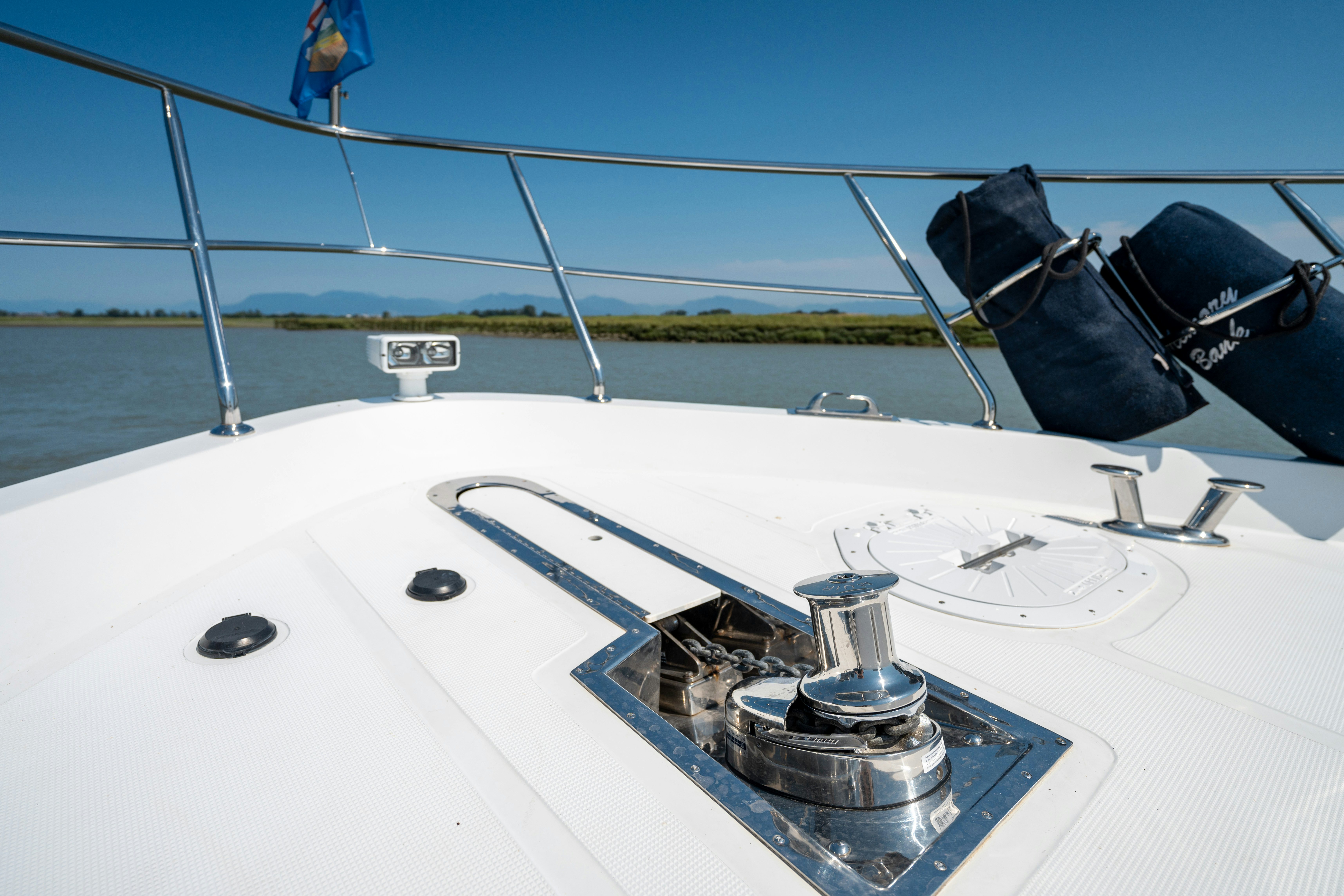 a boat with a metal bar on the front aboard MEMORY BANK Yacht for Sale