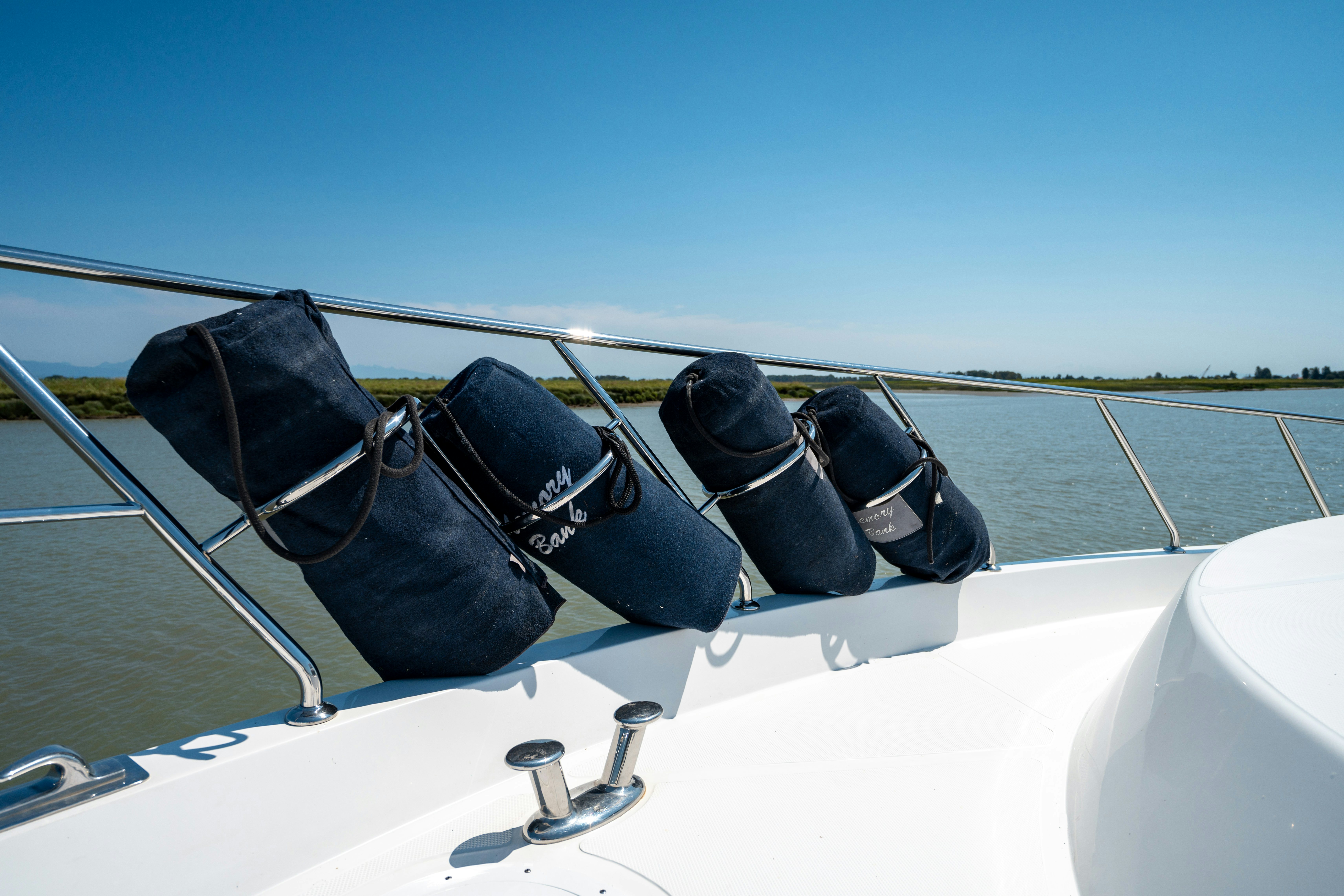 a person in a black costume on a boat aboard MEMORY BANK Yacht for Sale