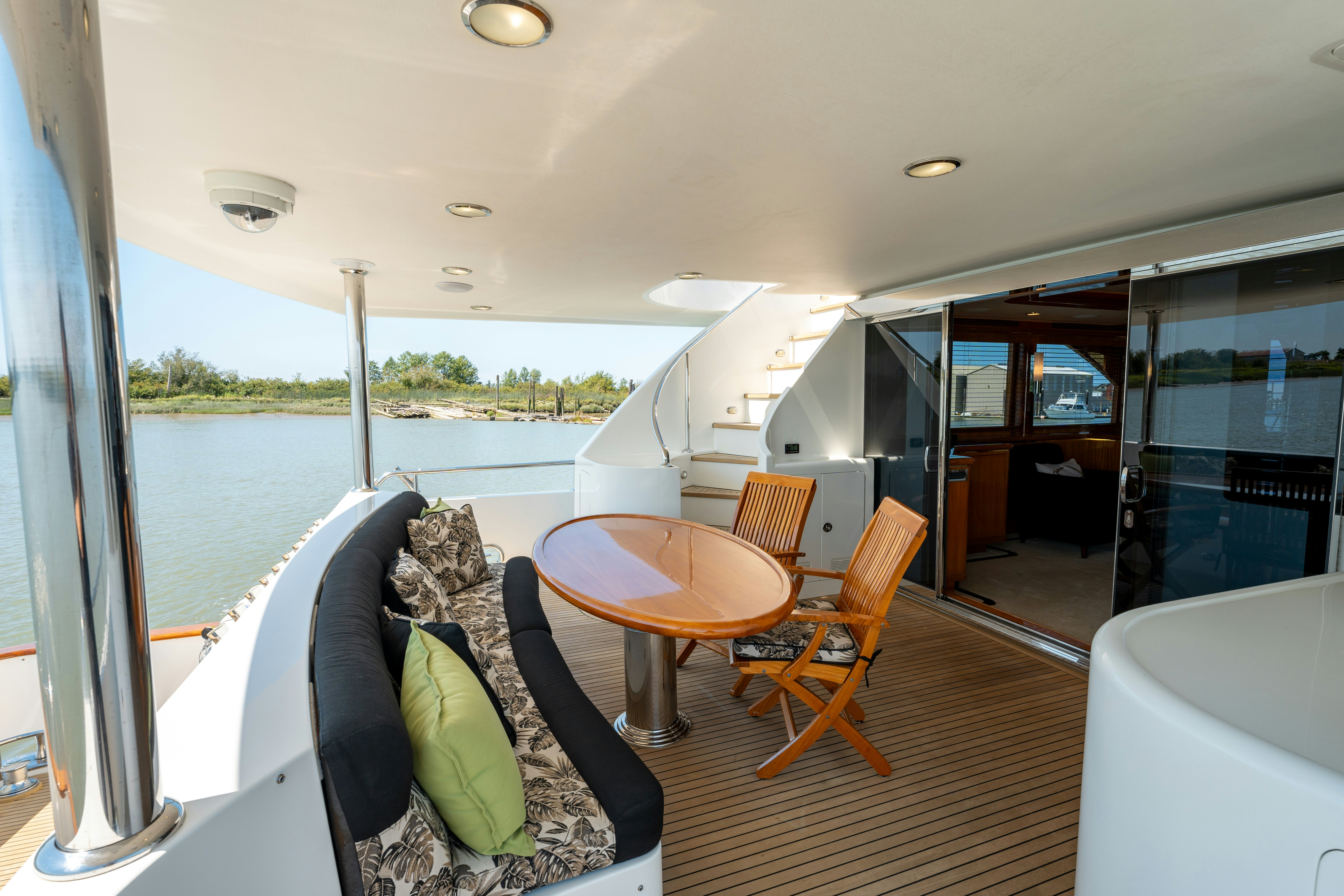 a room with a table and chairs aboard MEMORY BANK Yacht for Sale