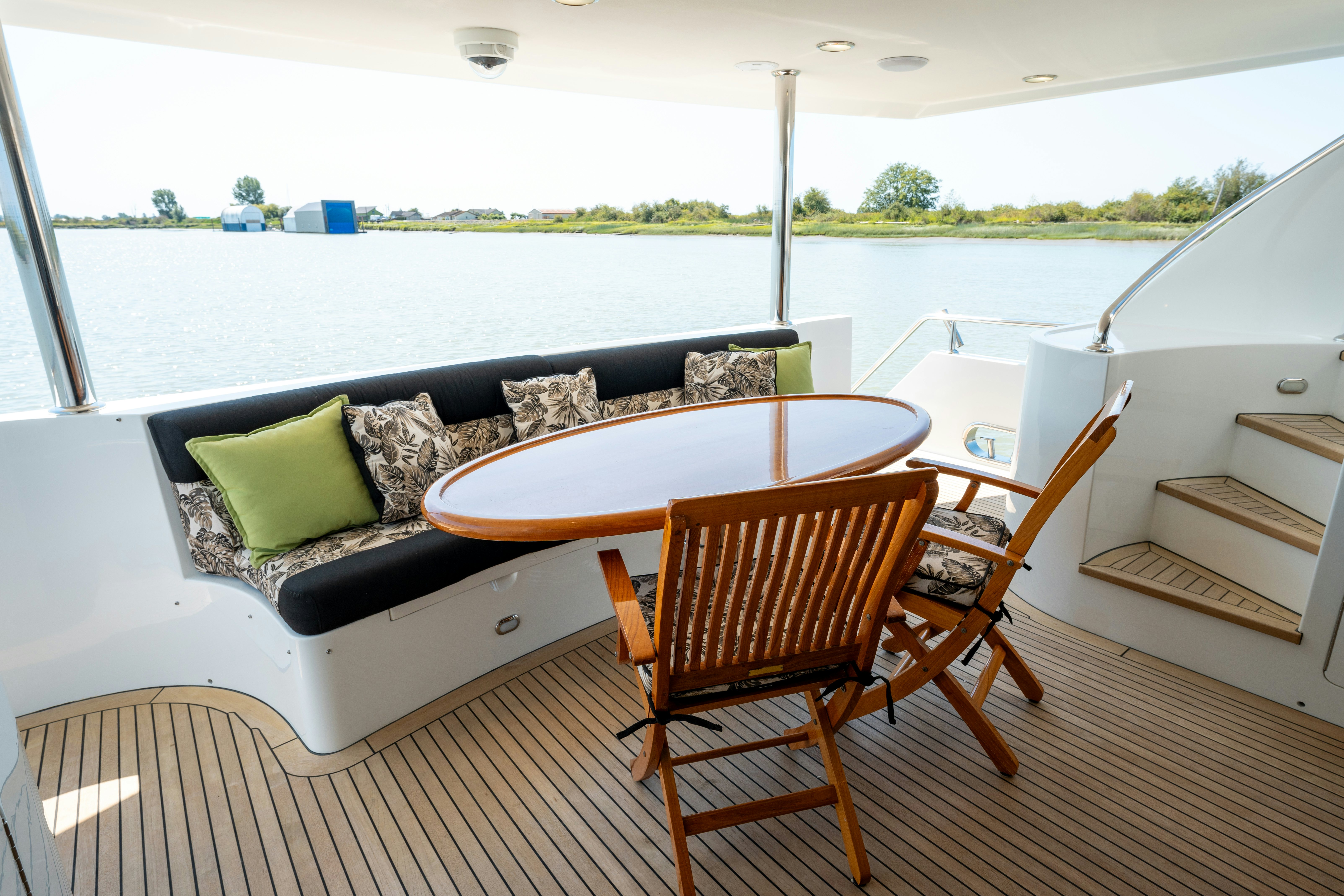 a living room with a couch and a table aboard MEMORY BANK Yacht for Sale