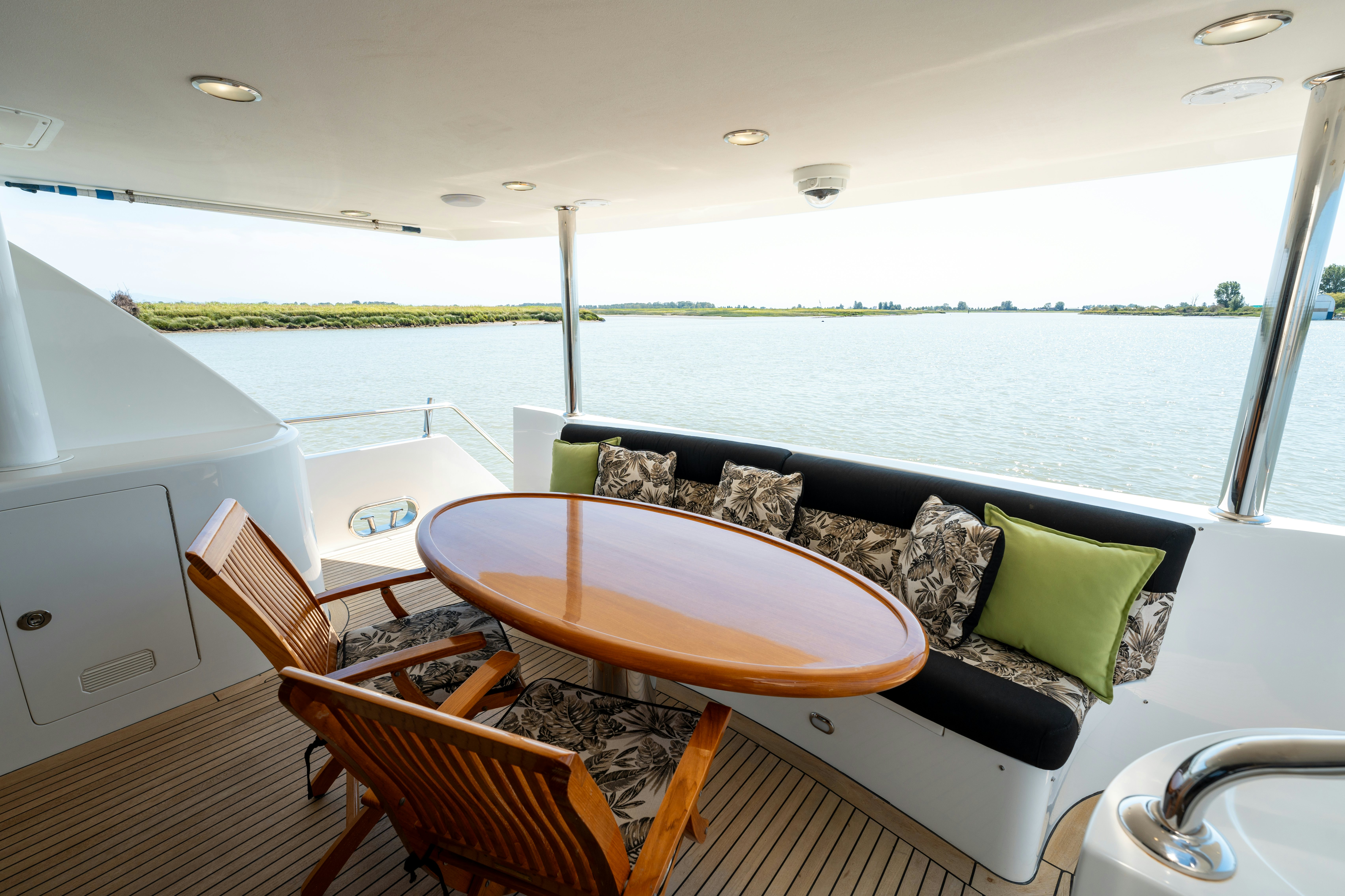 a table and chairs on a boat aboard MEMORY BANK Yacht for Sale