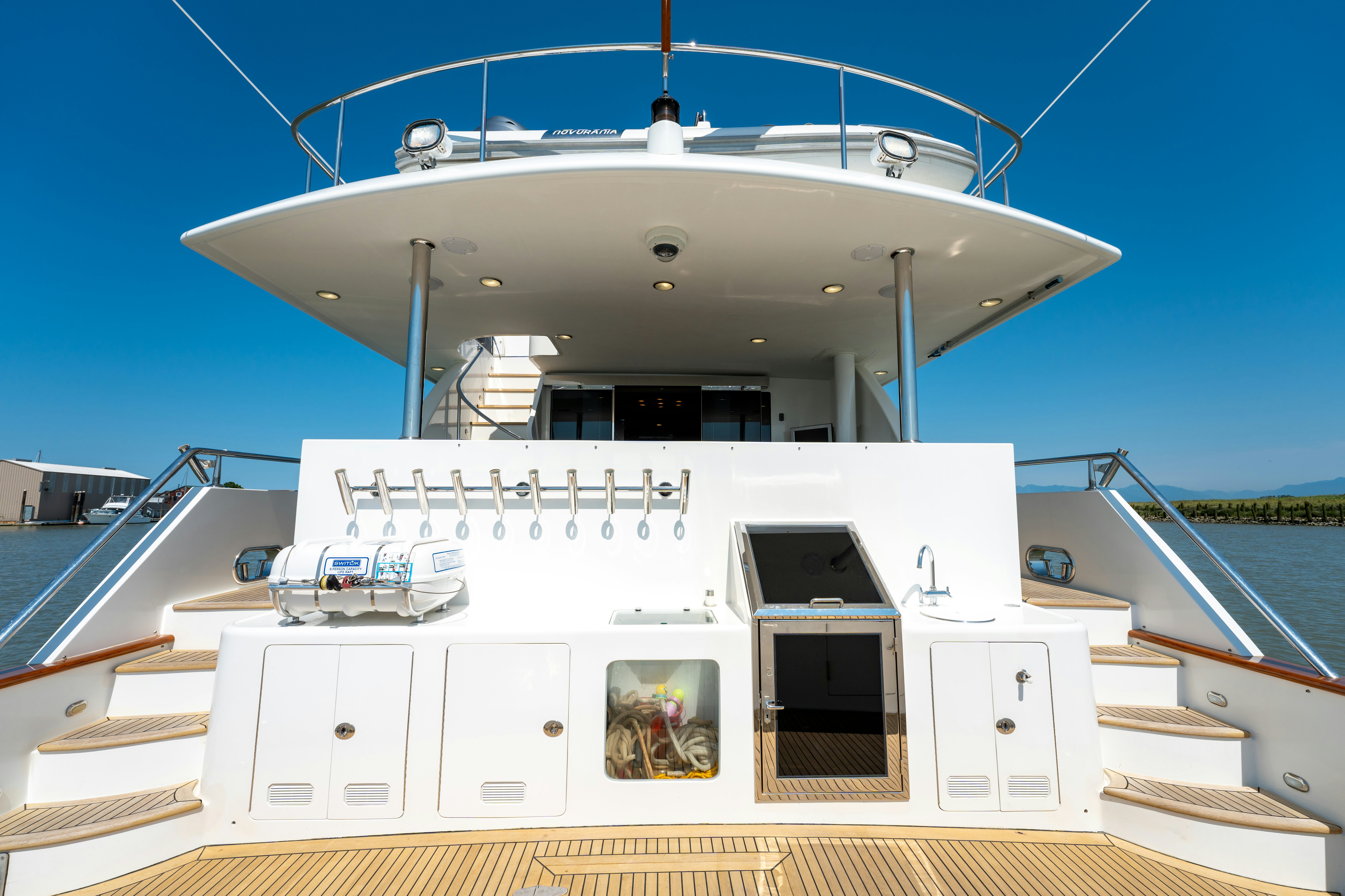 a large white boat aboard MEMORY BANK Yacht for Sale