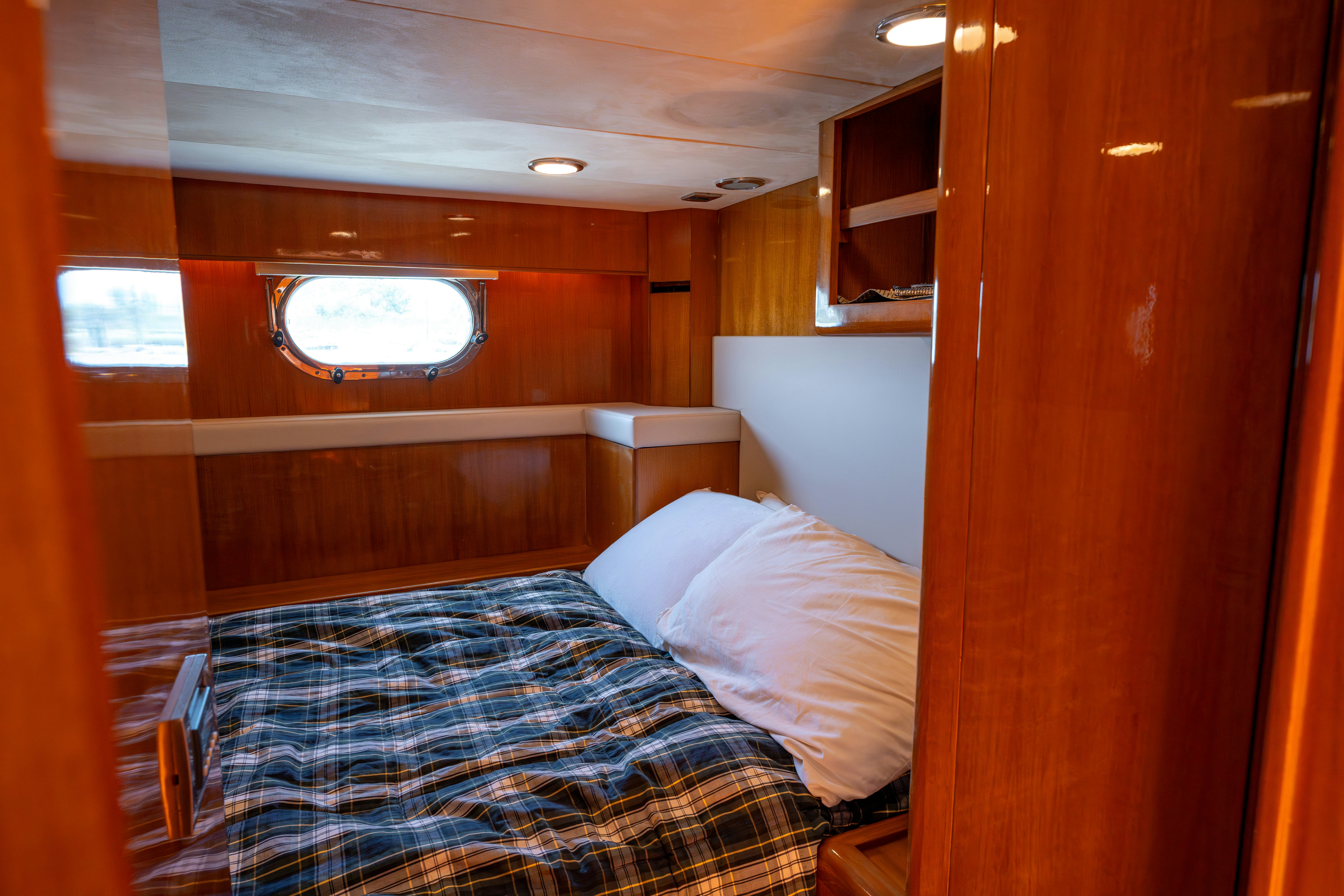 a room with a bed and a window aboard MEMORY BANK Yacht for Sale