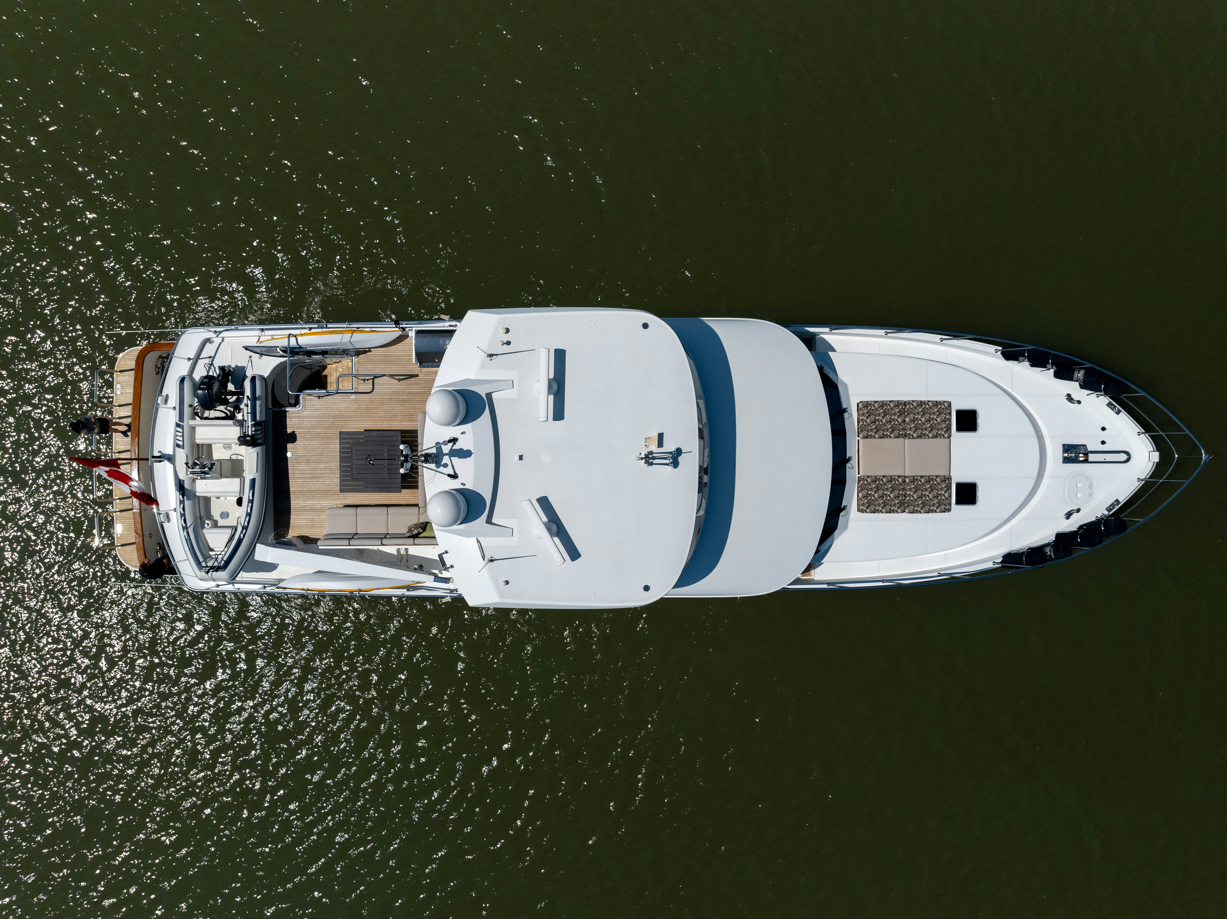 a white and blue object on a green surface aboard MEMORY BANK Yacht for Sale