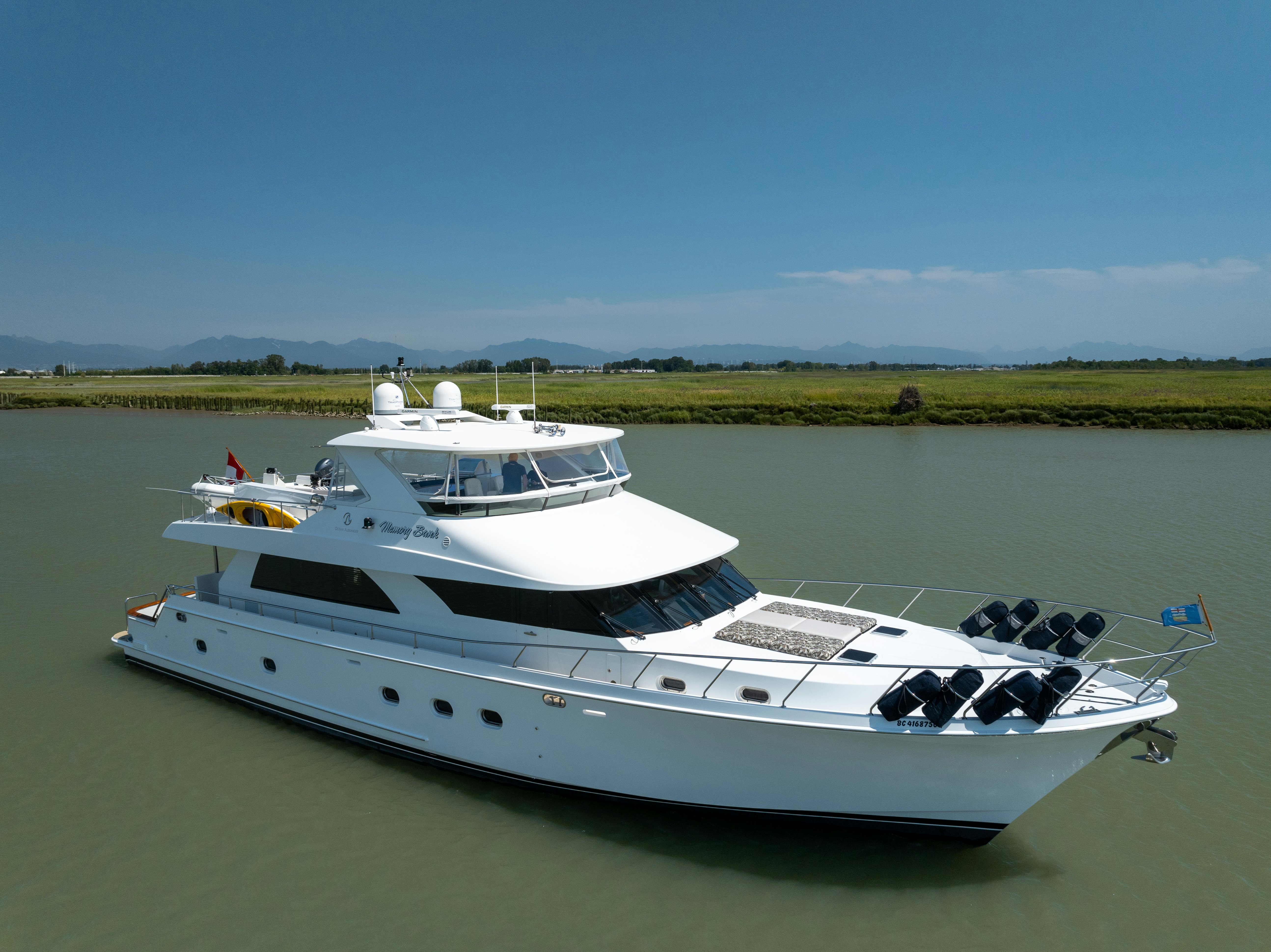 a white yacht on the water aboard MEMORY BANK Yacht for Sale