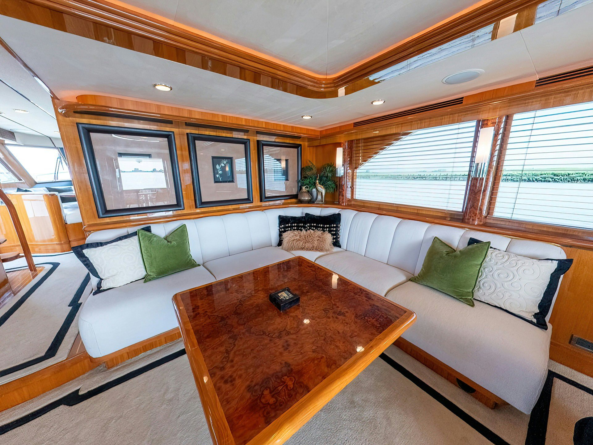 a living room with a couch and a table aboard MEMORY BANK Yacht for Sale