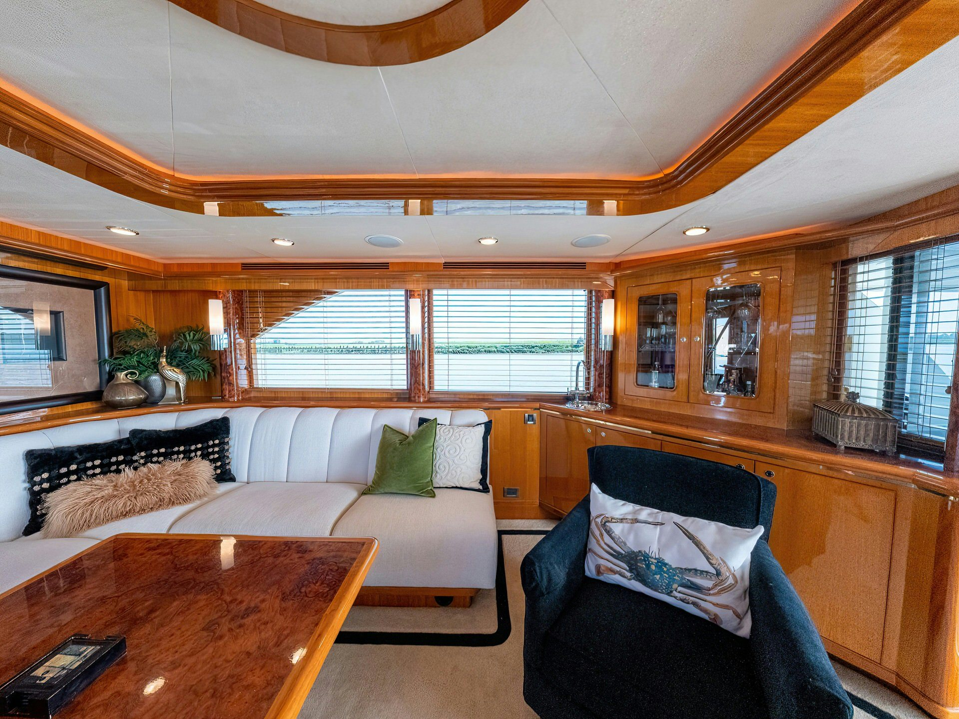 a living room with a couch and a table aboard MEMORY BANK Yacht for Sale