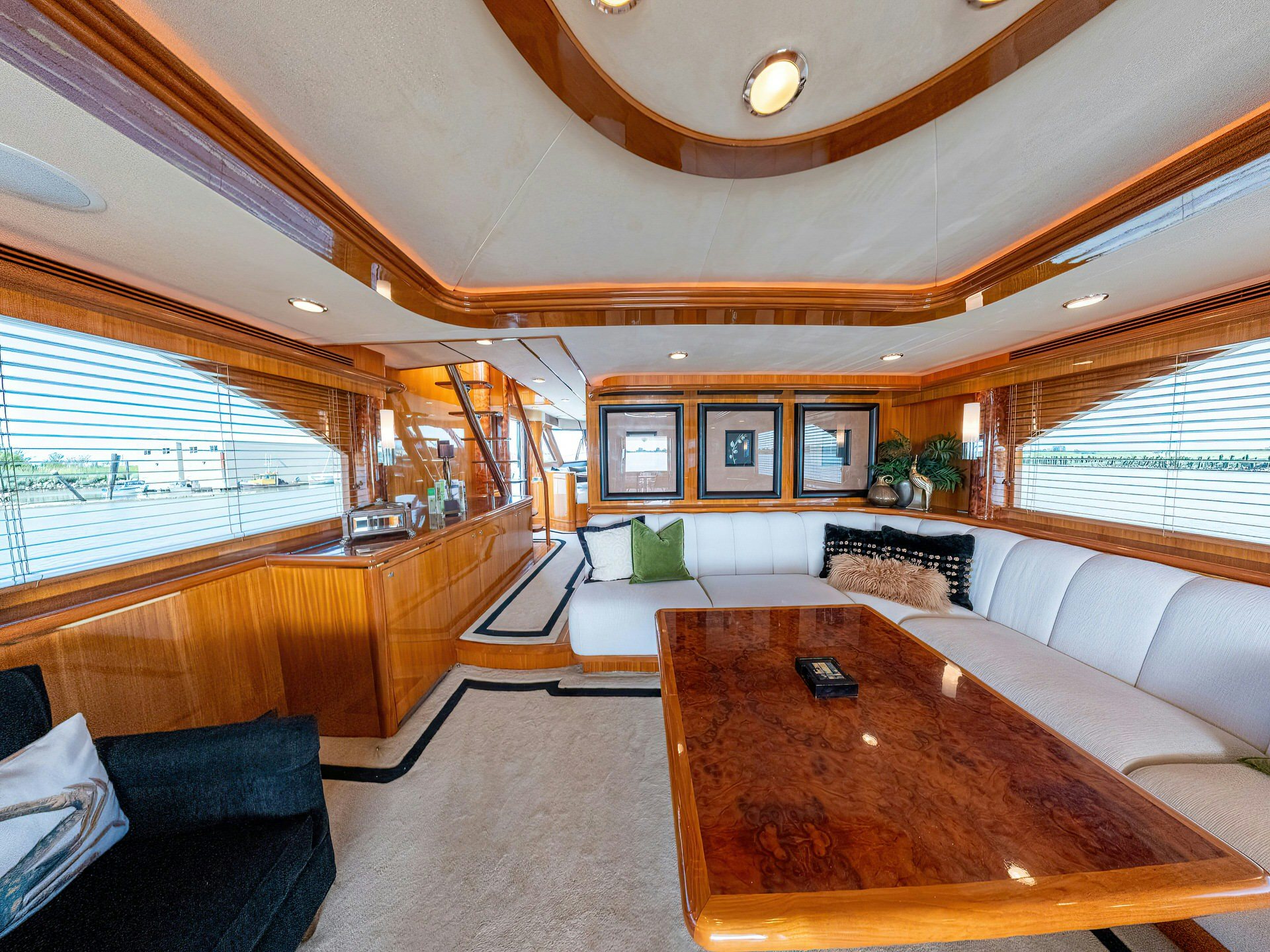 a large living room with a large window aboard MEMORY BANK Yacht for Sale