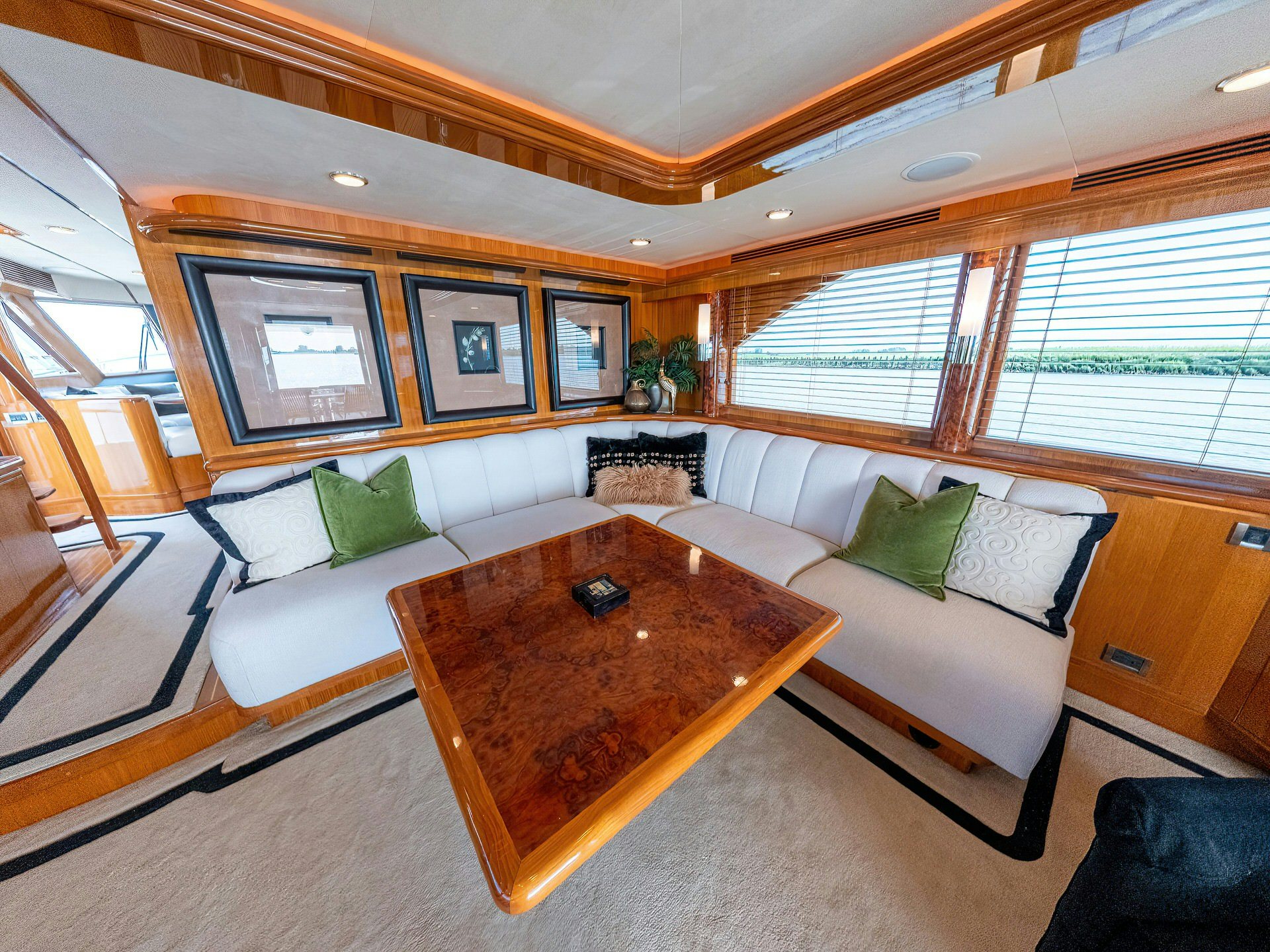 a living room with a couch and a table aboard MEMORY BANK Yacht for Sale
