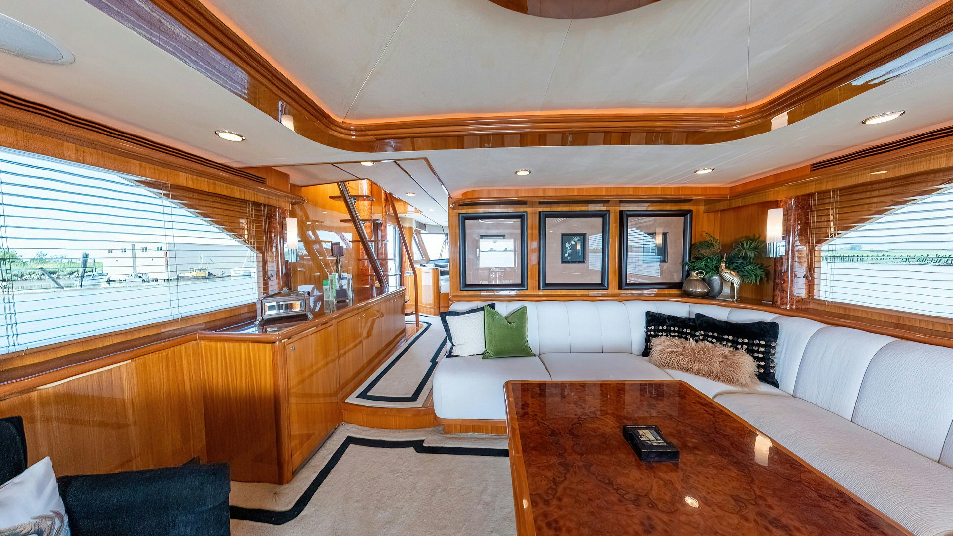 a living room with a couch and a table aboard MEMORY BANK Yacht for Sale