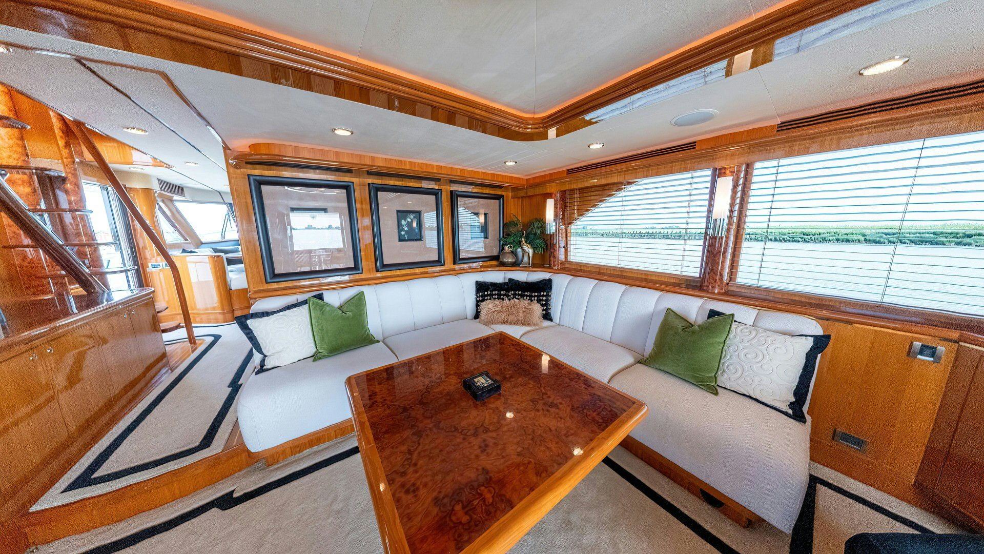a living room with a couch and a table aboard MEMORY BANK Yacht for Sale