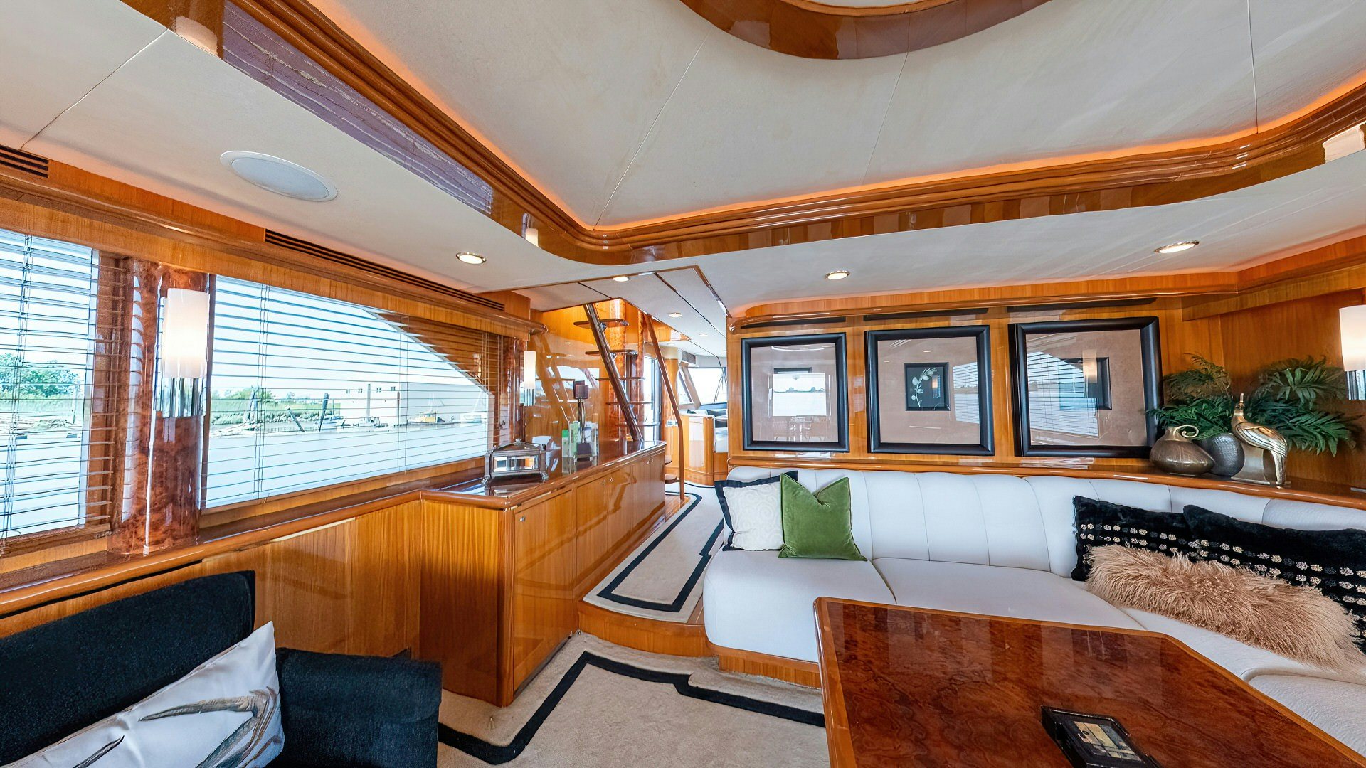a living room with a couch and a table aboard MEMORY BANK Yacht for Sale