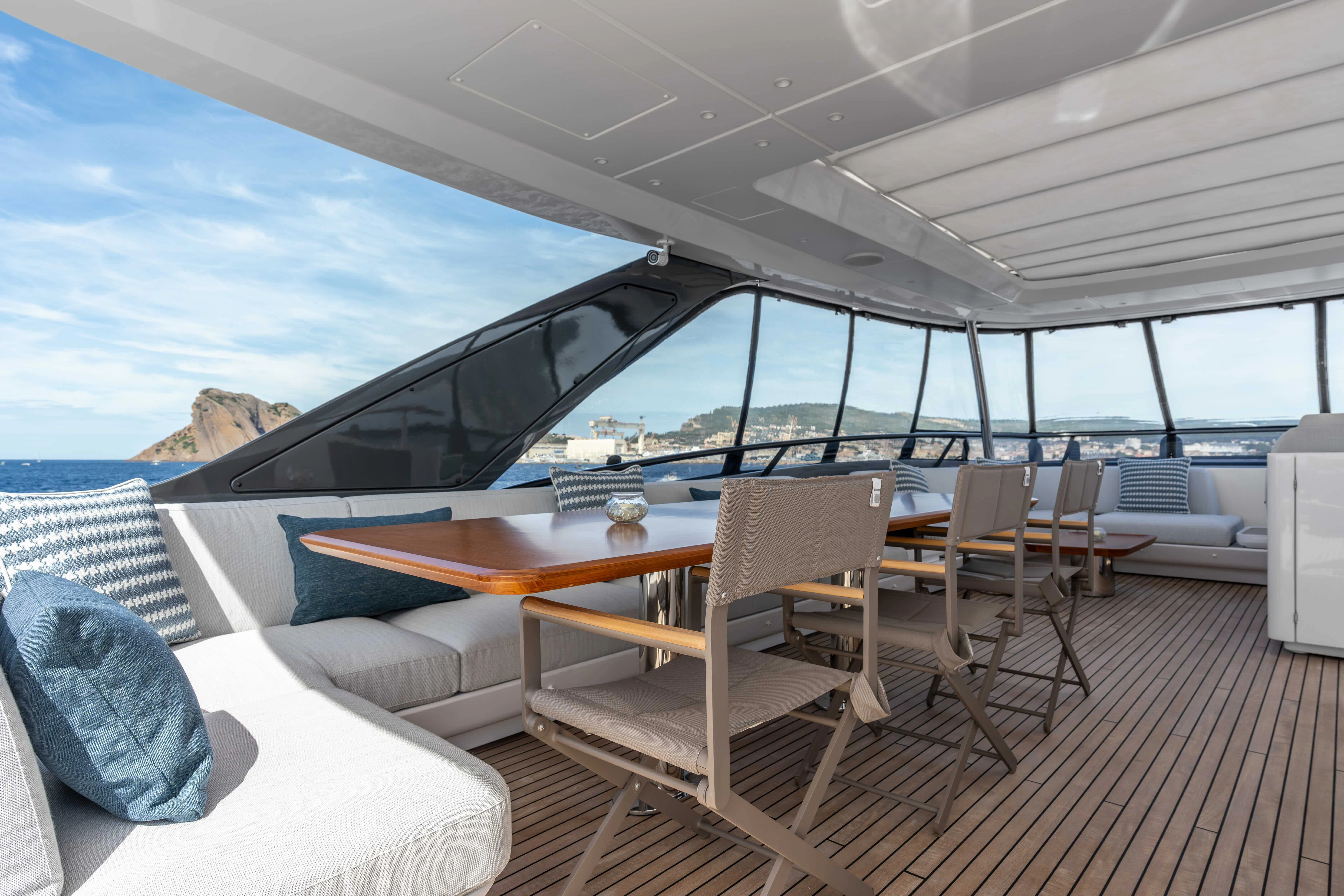 a deck with a large glass window aboard ST JUDE Yacht for Sale