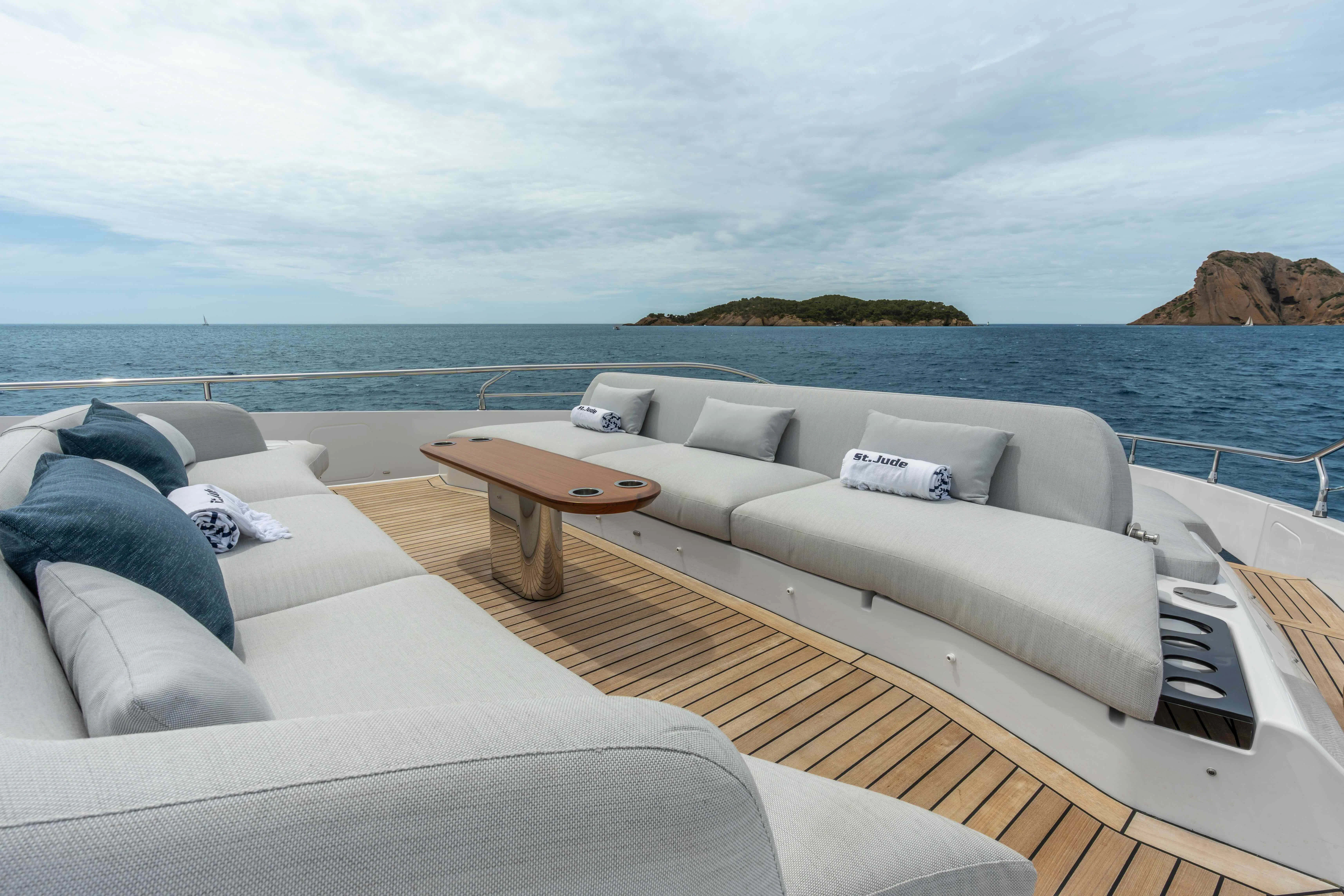 a couch and a table on a boat aboard ST JUDE Yacht for Sale