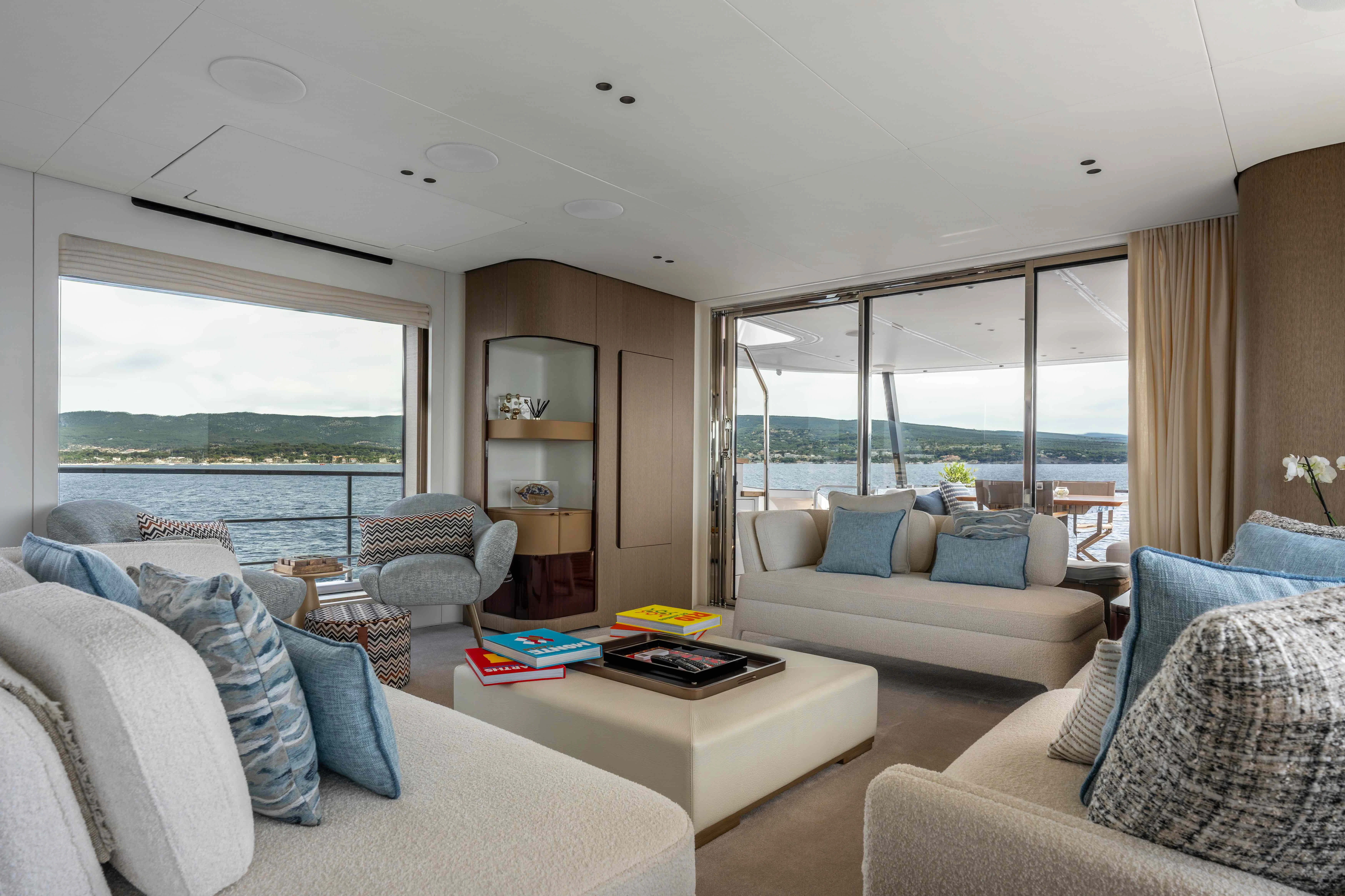 a living room with a large window aboard ST JUDE Yacht for Sale