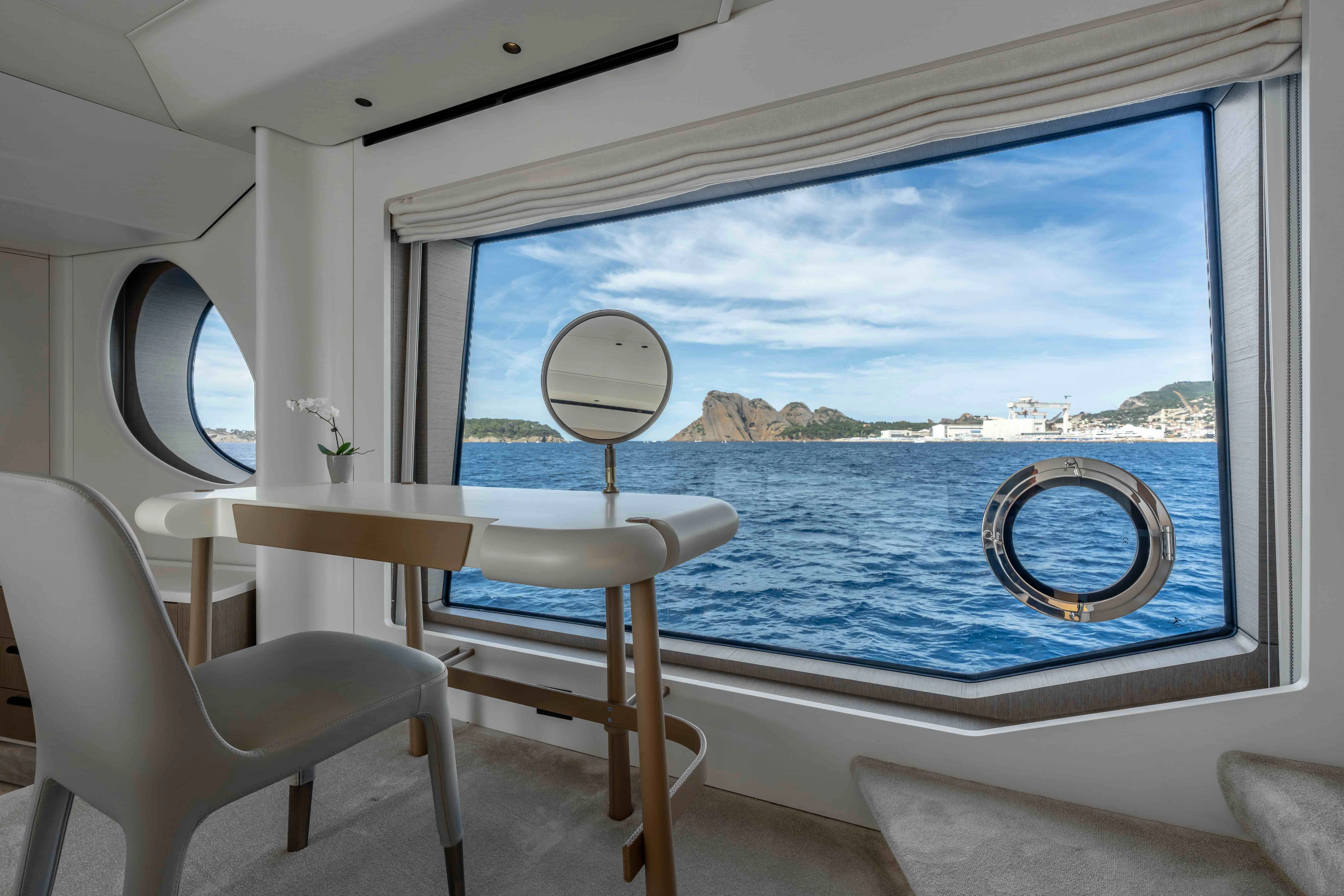 a room with a view of the water and land aboard ST JUDE Yacht for Sale