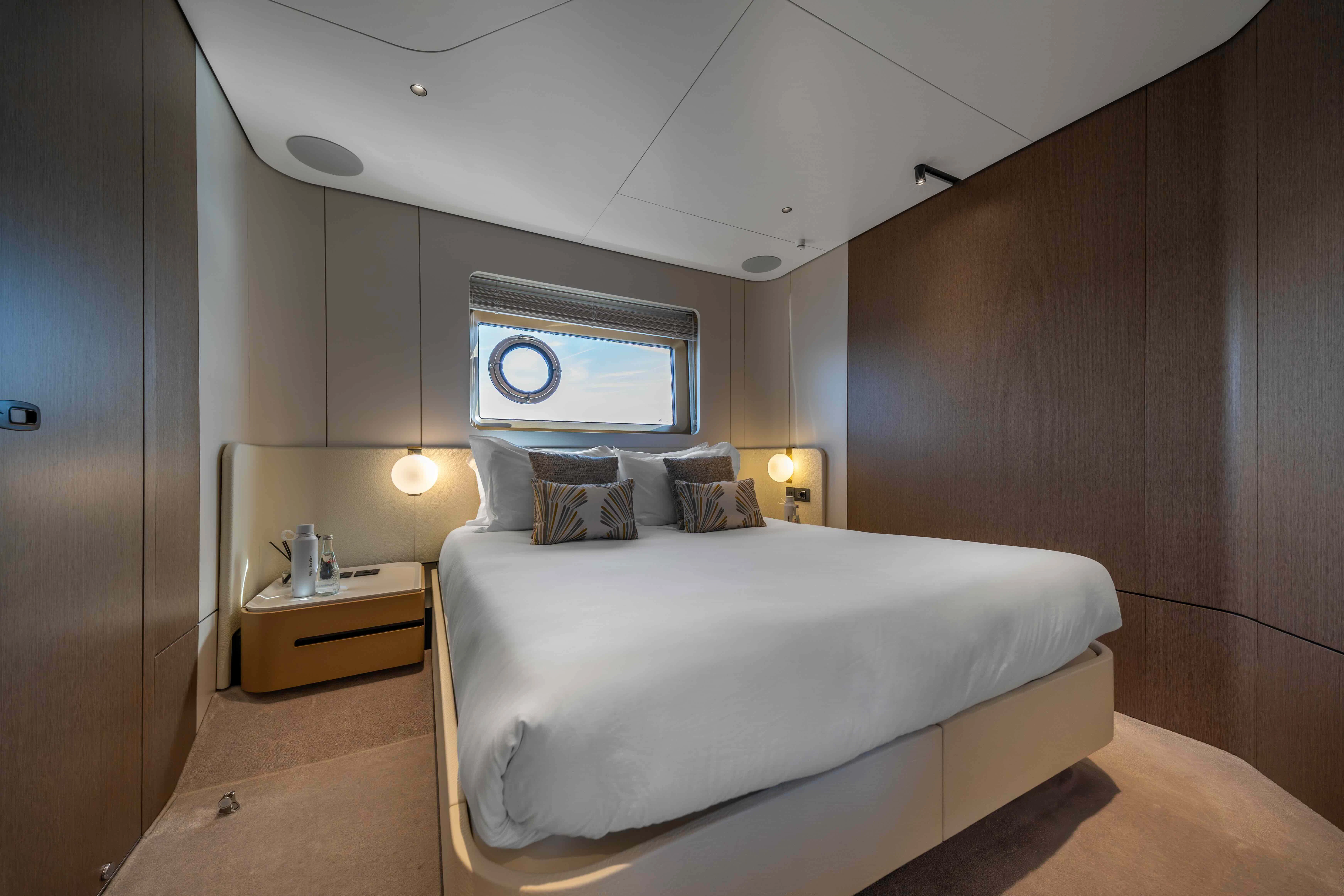 a bed in a room aboard ST JUDE Yacht for Sale