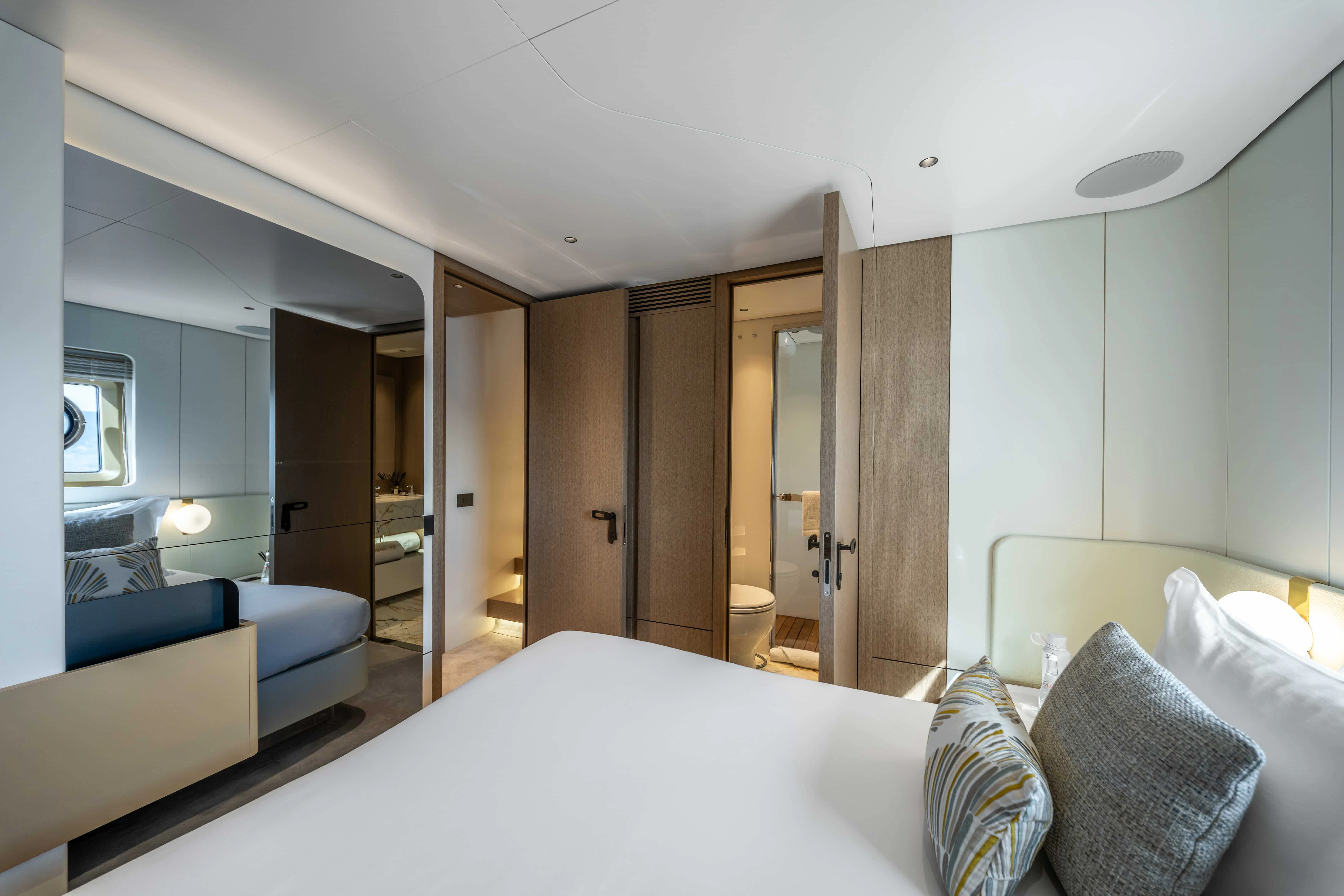 a large hotel room with a bed aboard ST JUDE Yacht for Sale