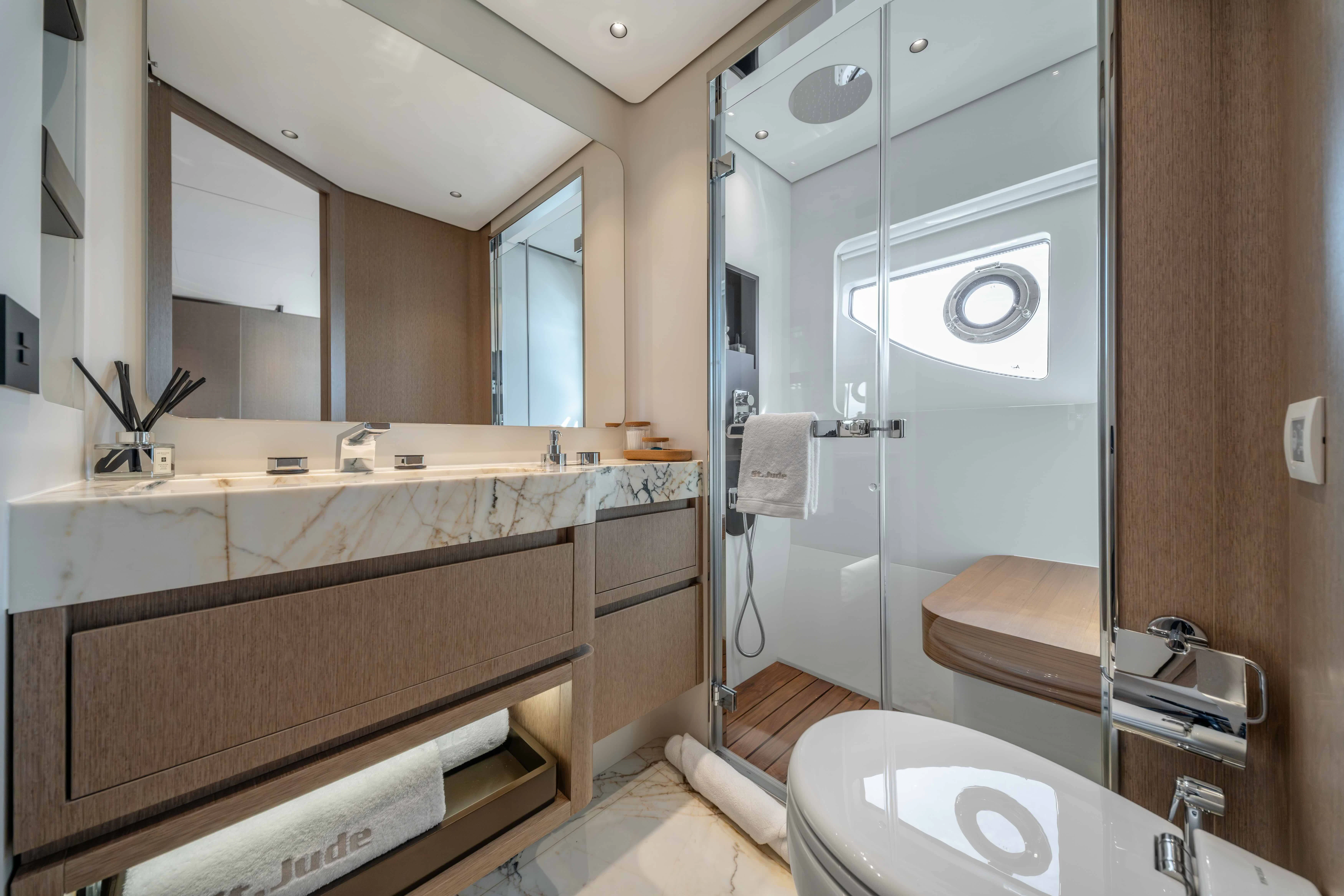a bathroom with a standup shower aboard ST JUDE Yacht for Sale