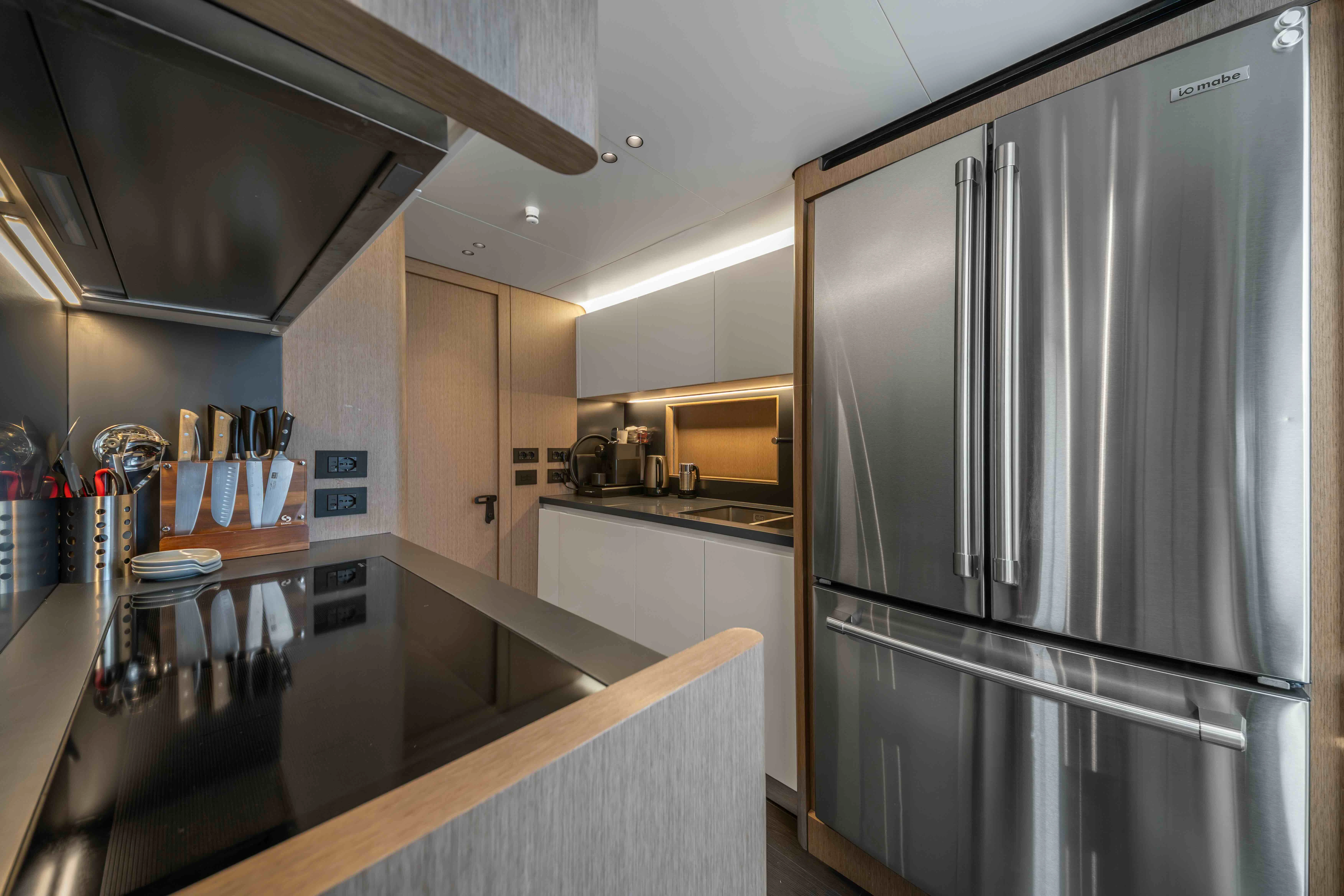 a kitchen with stainless steel appliances aboard ST JUDE Yacht for Sale