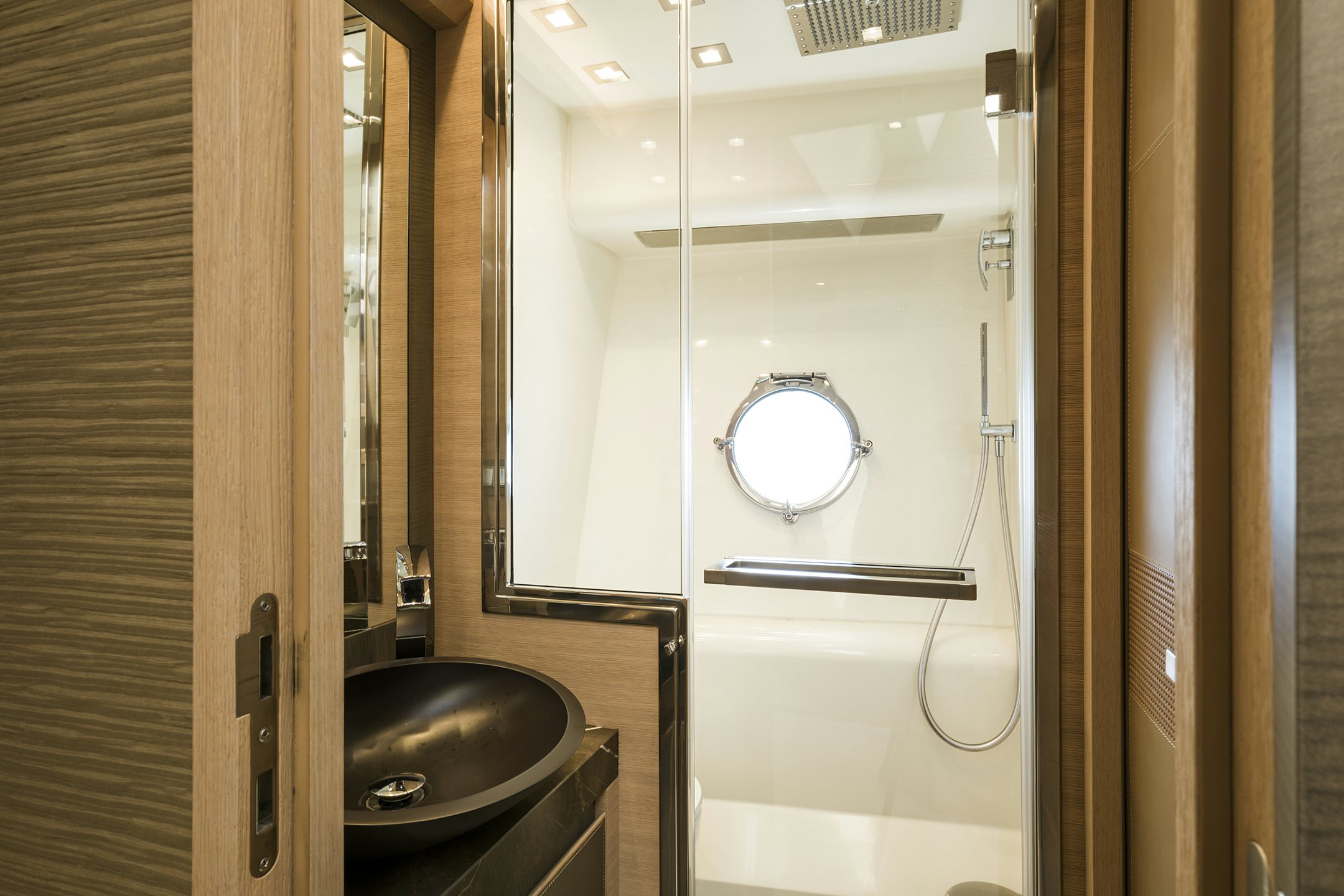 a bathroom with a sink and a mirror aboard CRAZY DIAMOND Yacht for Sale