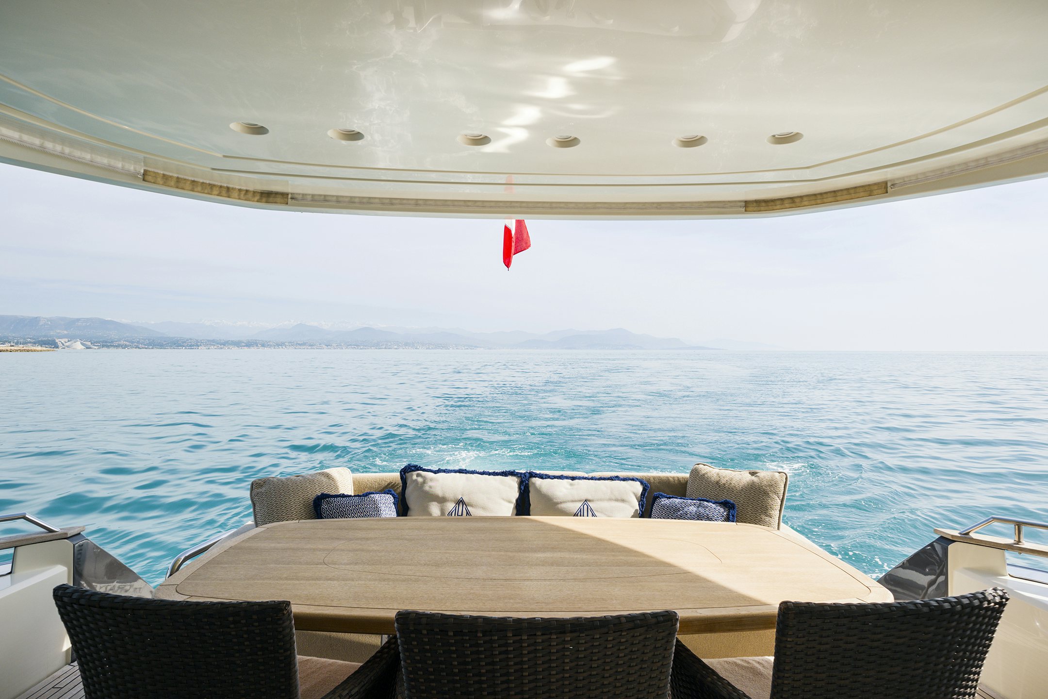 a large boat with a beach behind it aboard CRAZY DIAMOND Yacht for Sale