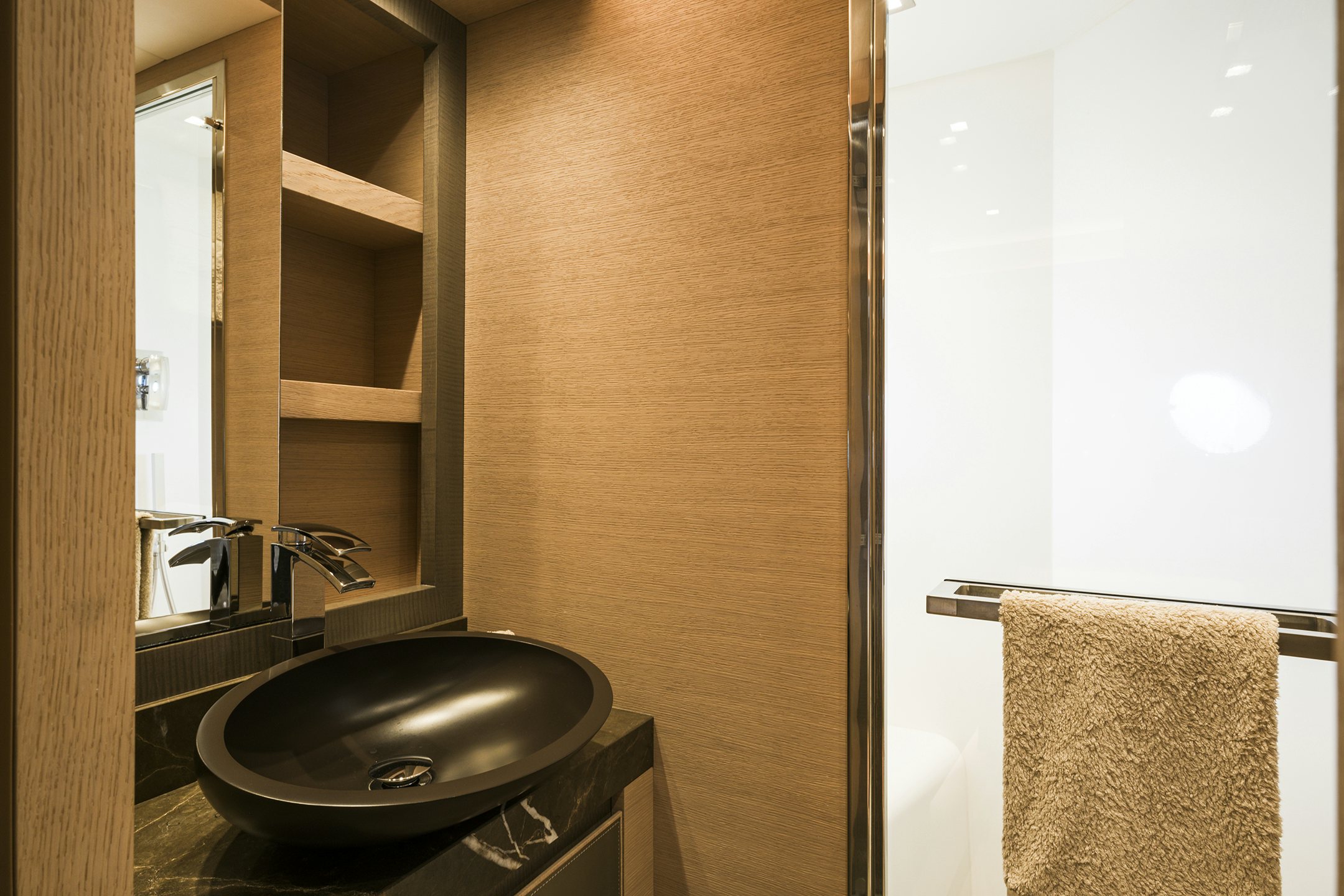 a bathroom with a sink and a mirror aboard CRAZY DIAMOND Yacht for Sale