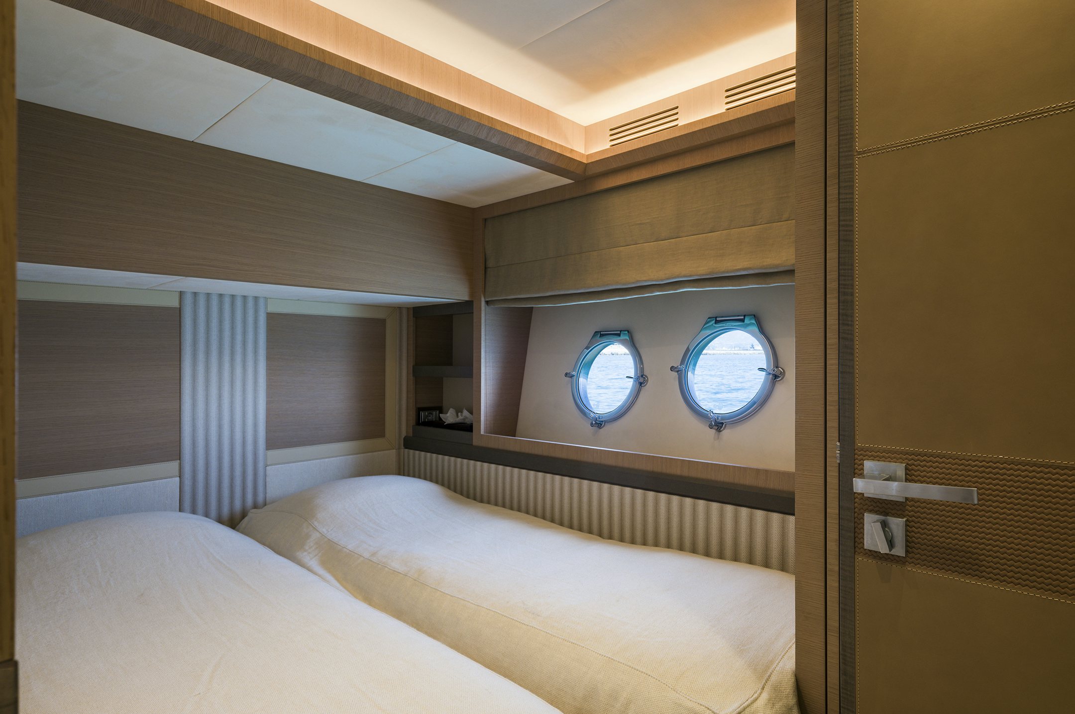a room with a bed and a window aboard CRAZY DIAMOND Yacht for Sale