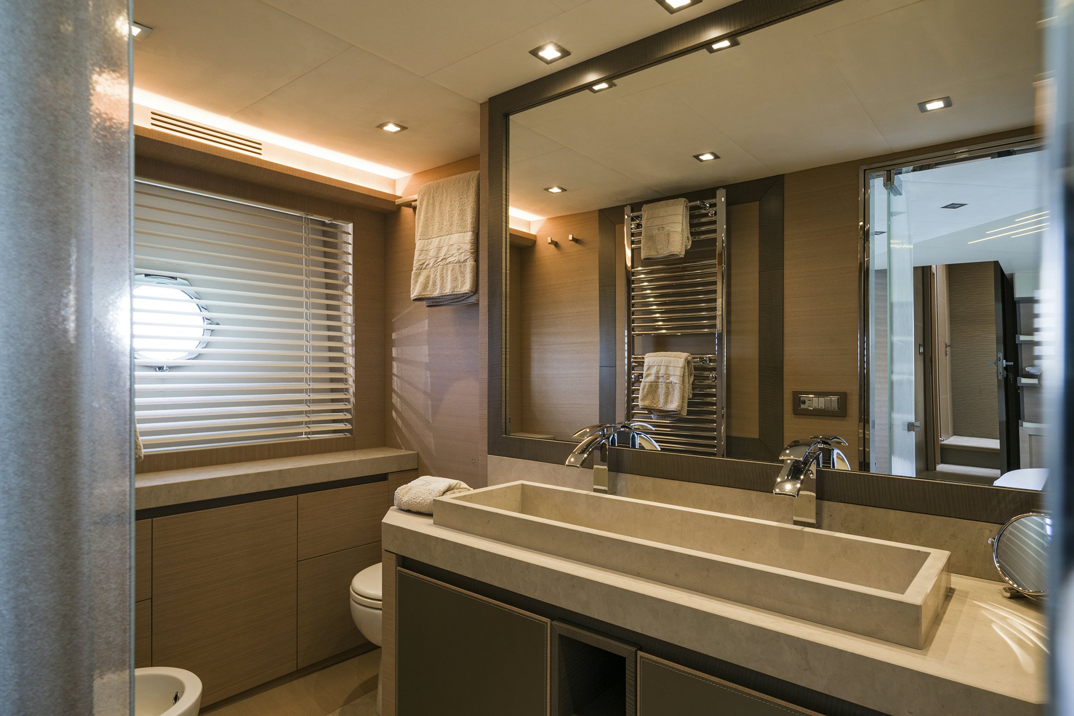 a bathroom with a large mirror aboard CRAZY DIAMOND Yacht for Sale