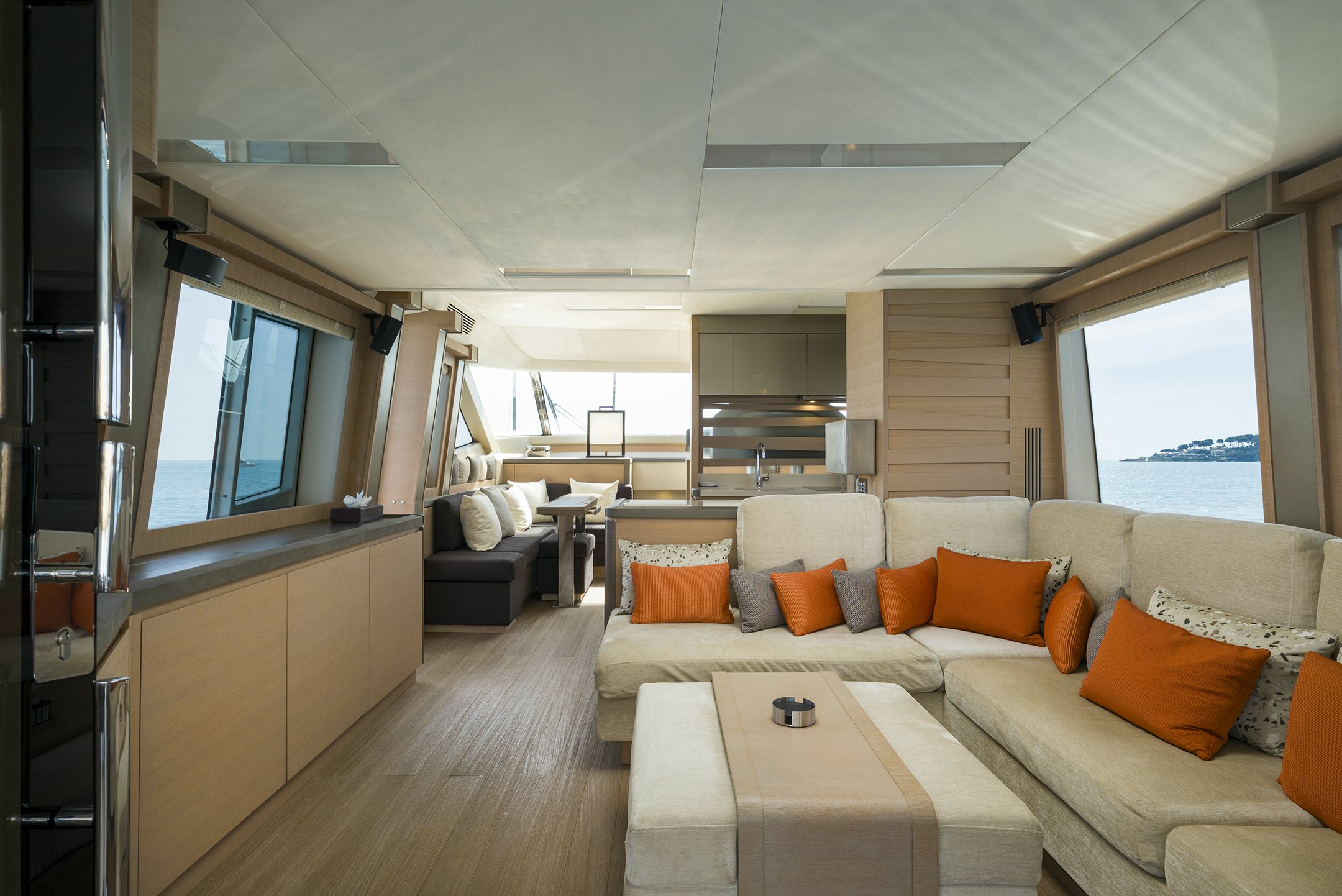 a living room with a couch and a table aboard CRAZY DIAMOND Yacht for Sale