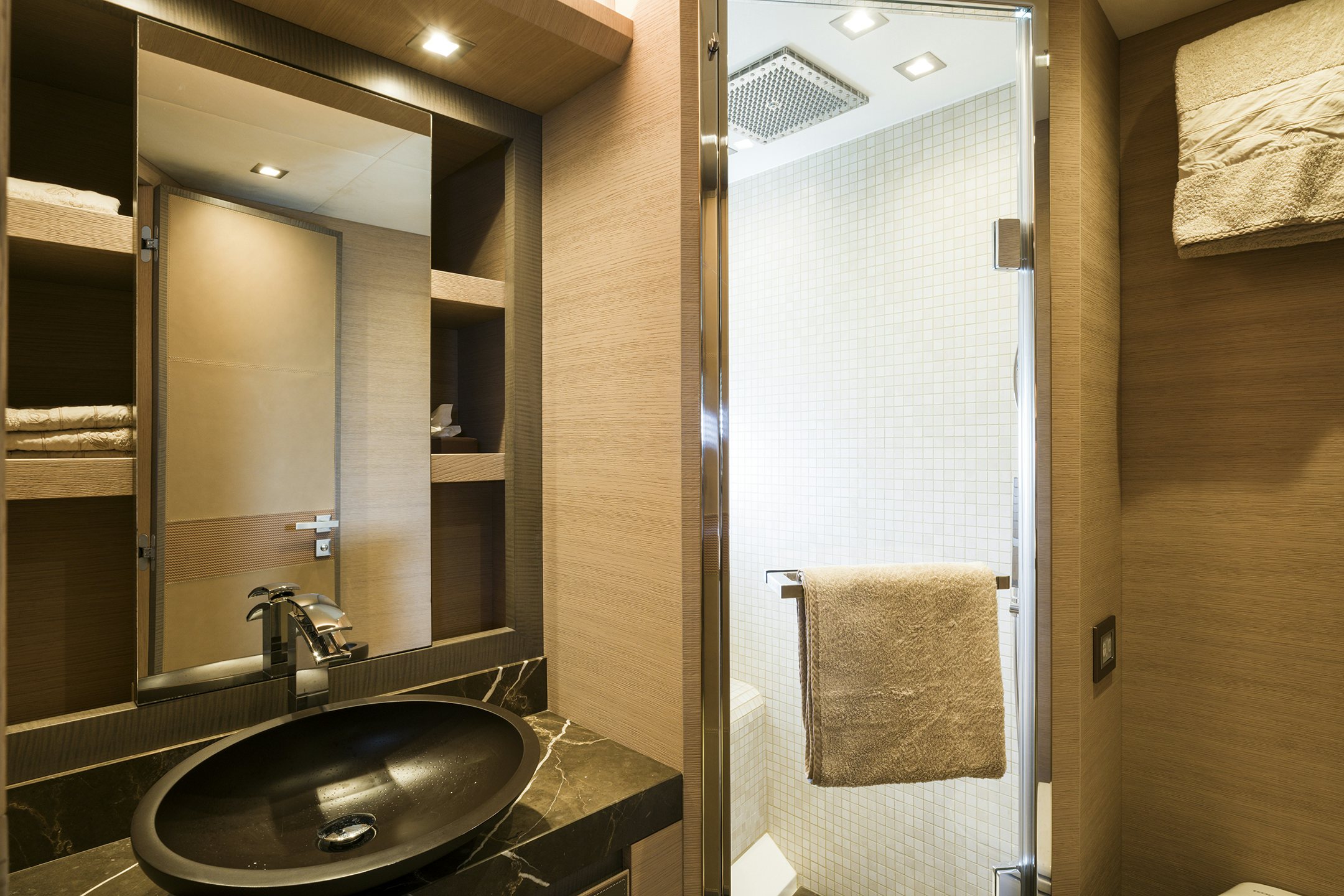 a bathroom with a sink and a mirror aboard CRAZY DIAMOND Yacht for Sale