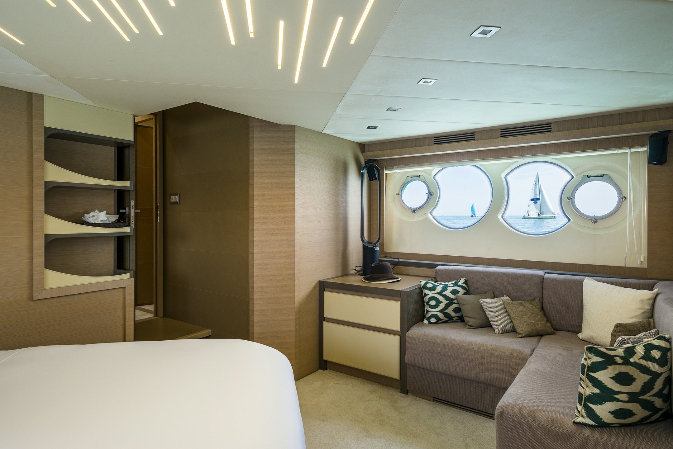 a room with a couch and a bed aboard CRAZY DIAMOND Yacht for Sale