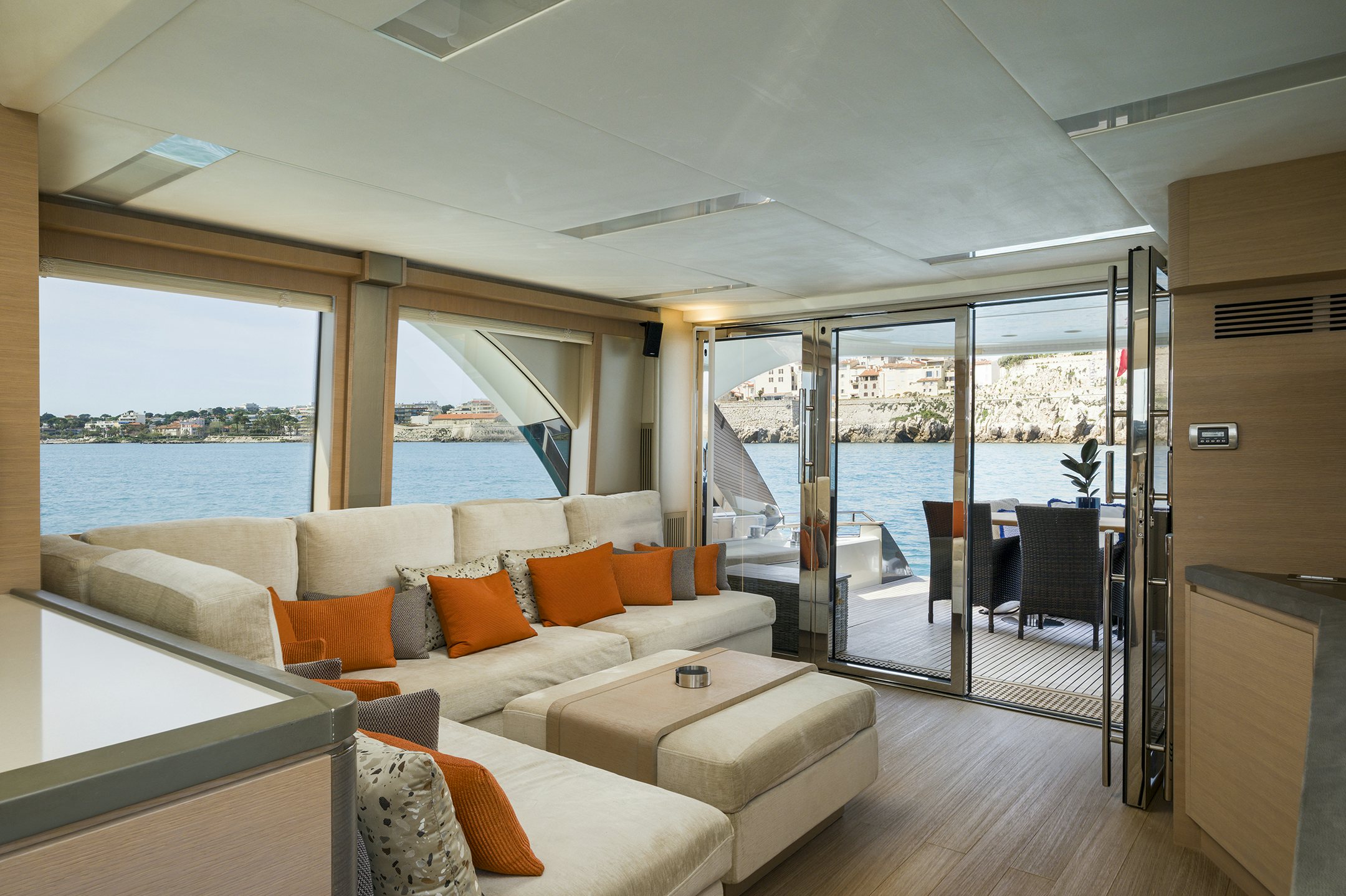 a living room with a large glass door aboard CRAZY DIAMOND Yacht for Sale