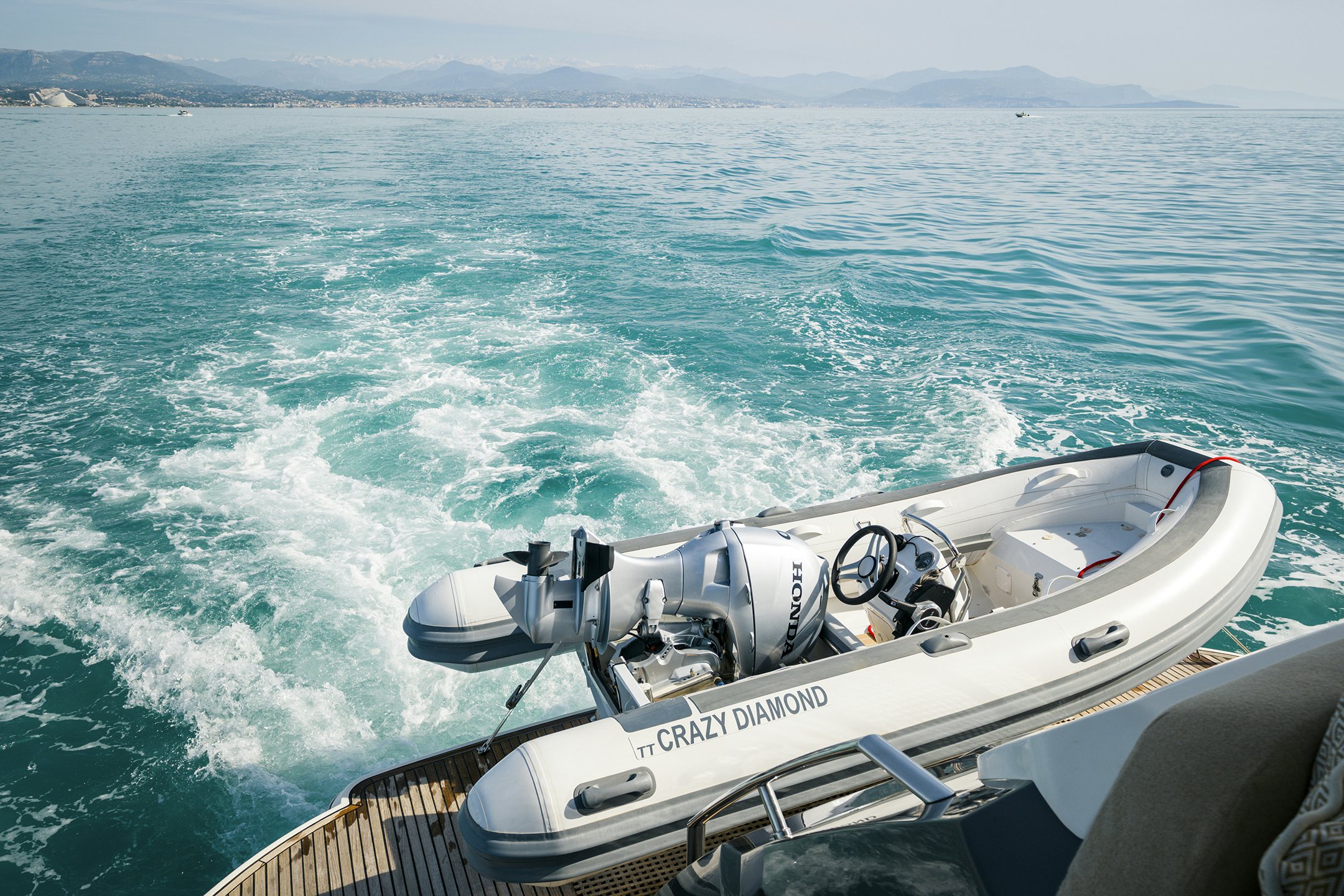 a boat with a motor attached to it aboard CRAZY DIAMOND Yacht for Sale