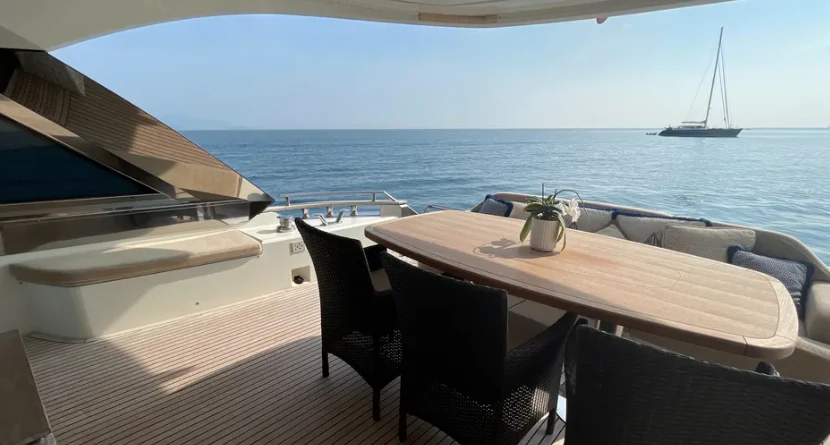 a table and chairs on a boat aboard CRAZY DIAMOND Yacht for Sale