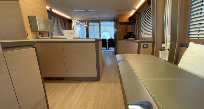 a kitchen with a large island aboard CRAZY DIAMOND Yacht for Sale