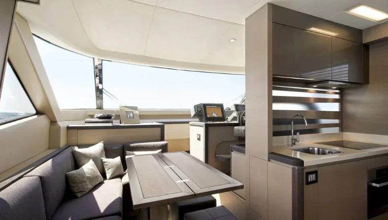 a room with a couch and a sink aboard CRAZY DIAMOND Yacht for Sale