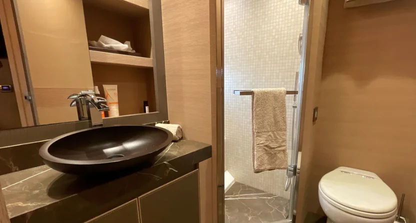 a bathroom with a sink and a toilet aboard CRAZY DIAMOND Yacht for Sale