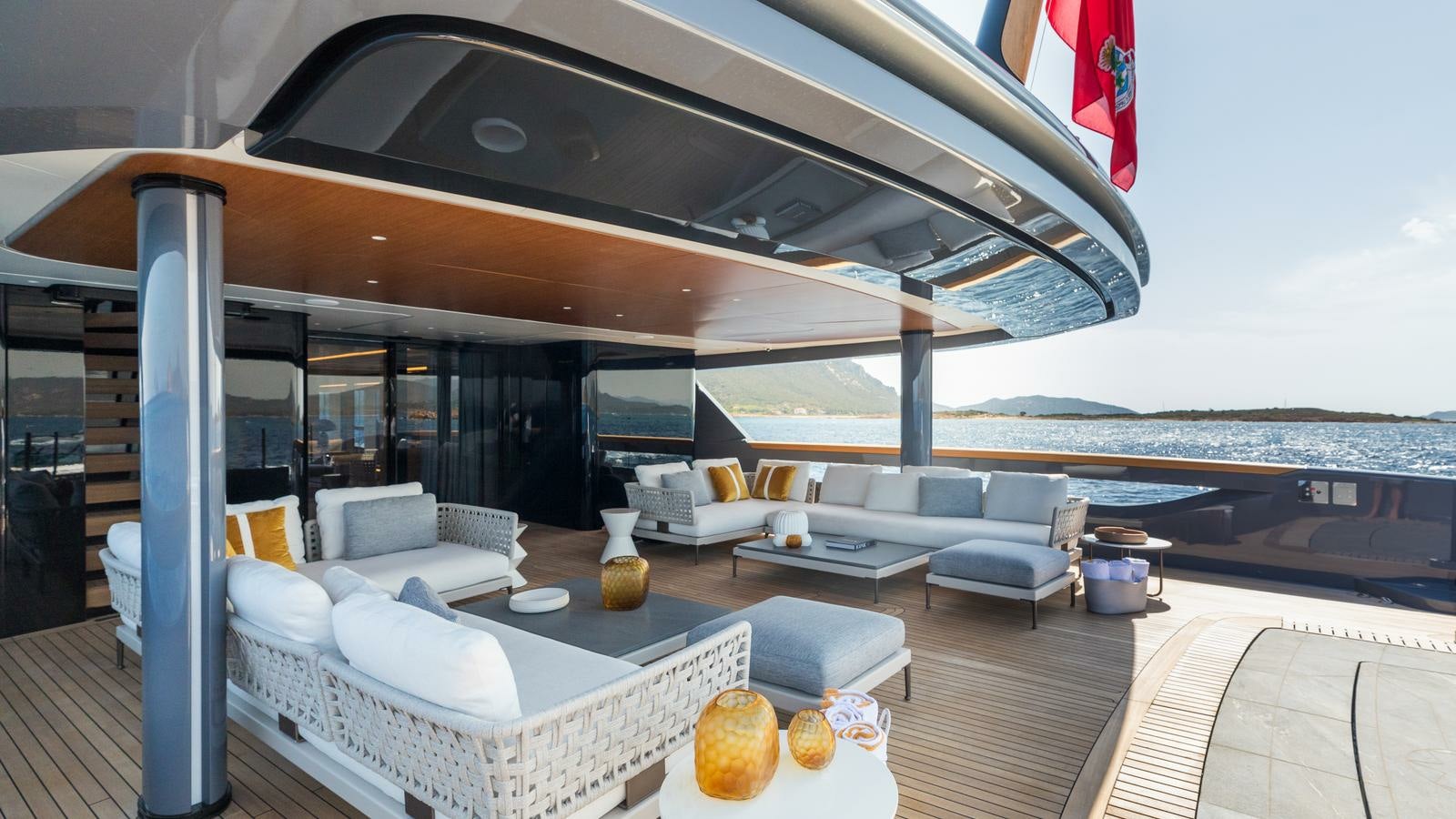 a room with a couch and a table and chairs aboard AKULA Yacht for Charter