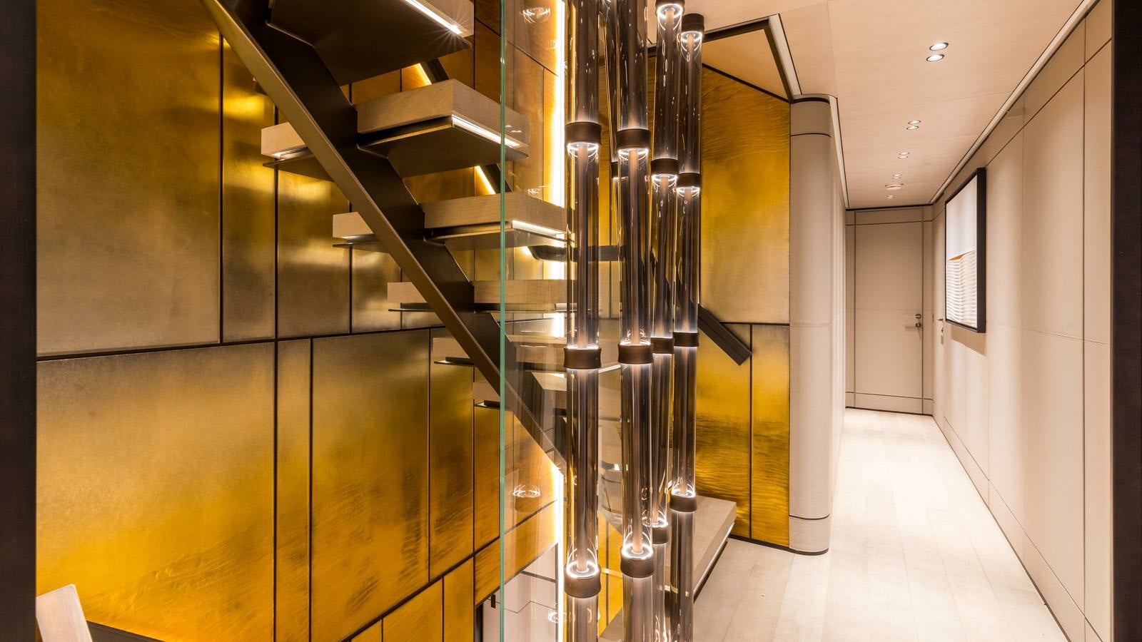 a large room with glass walls aboard AKULA Yacht for Charter